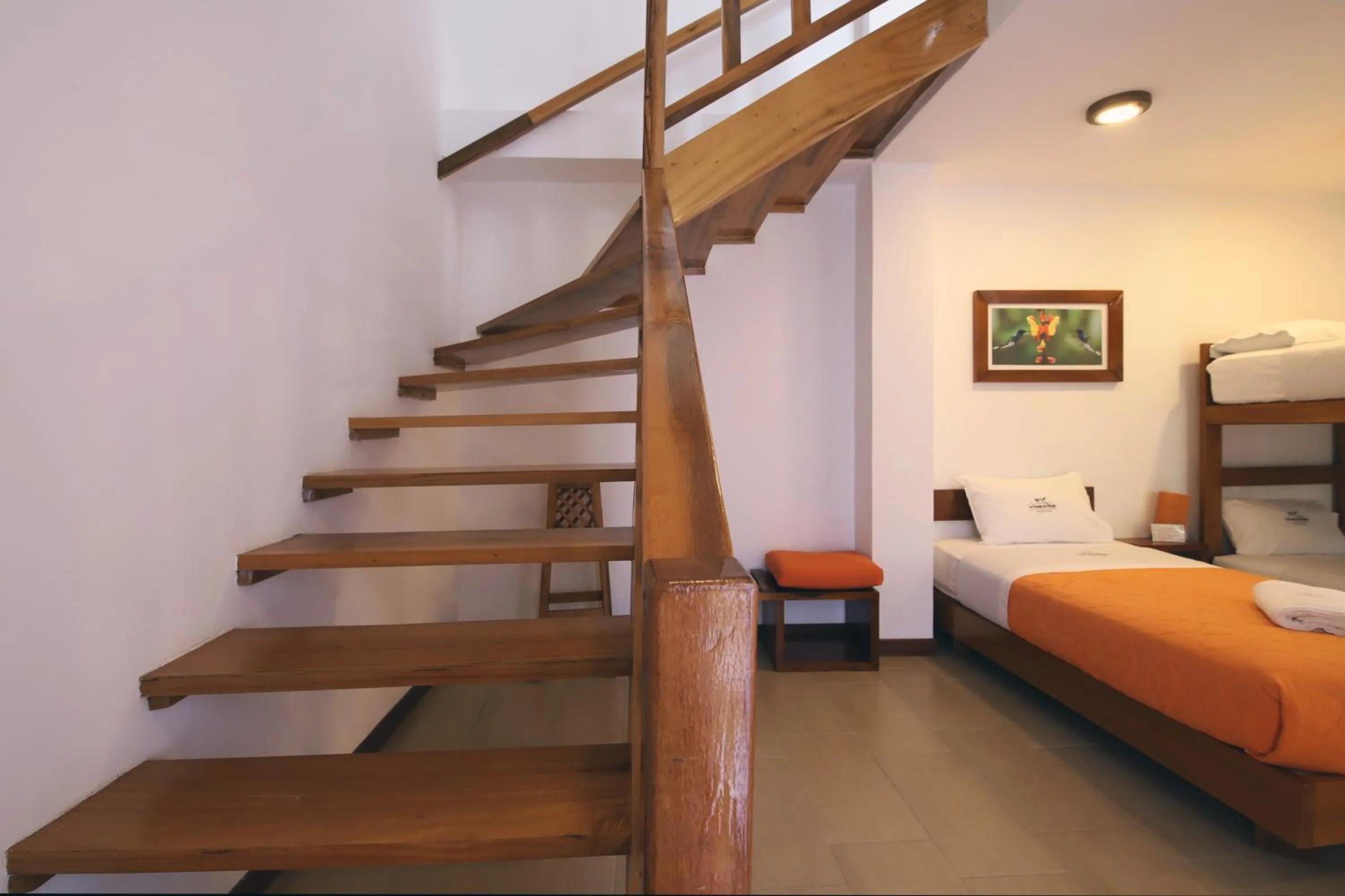 Bed in La Posada de Mindo