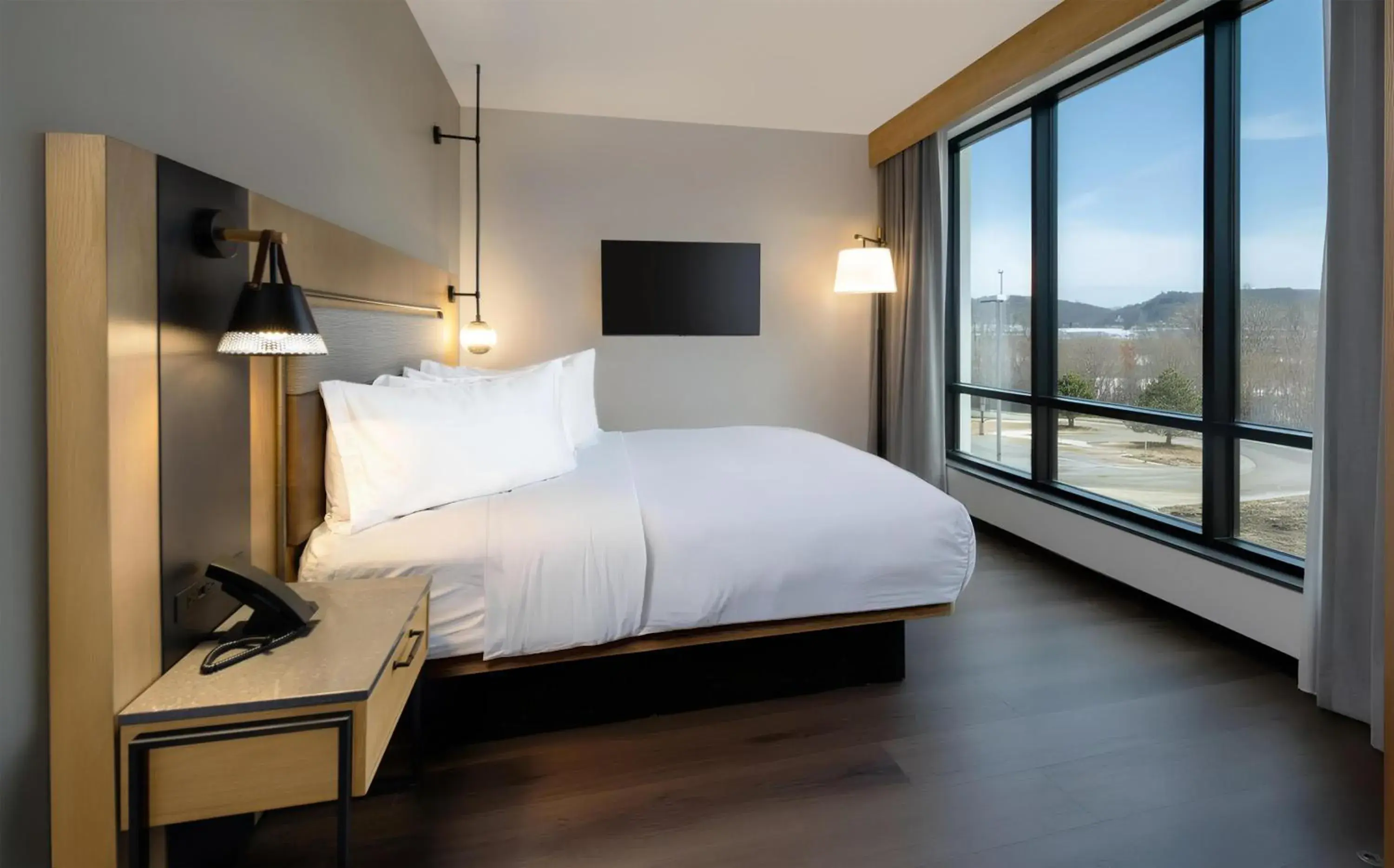 Bed in The Key Hotel Dubuque, Tapestry Collection By Hilton Bed in The Key Hotel Dubuque, Tapestry Collection By Hilton