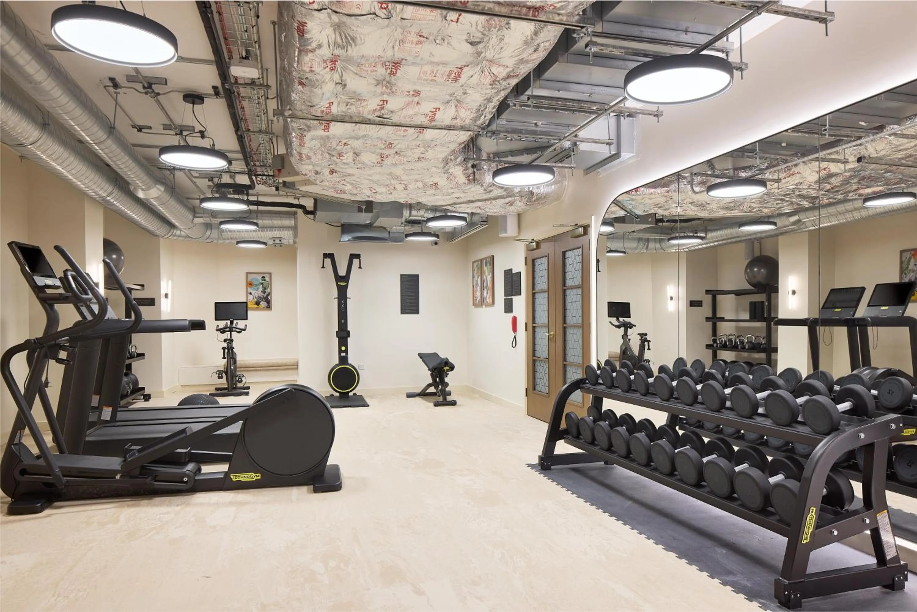 Fitness centre/facilities in The Derby London City, Curio Collection By Hilton
