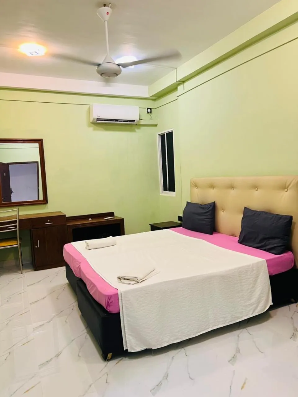 Bed in Metro City Hotel