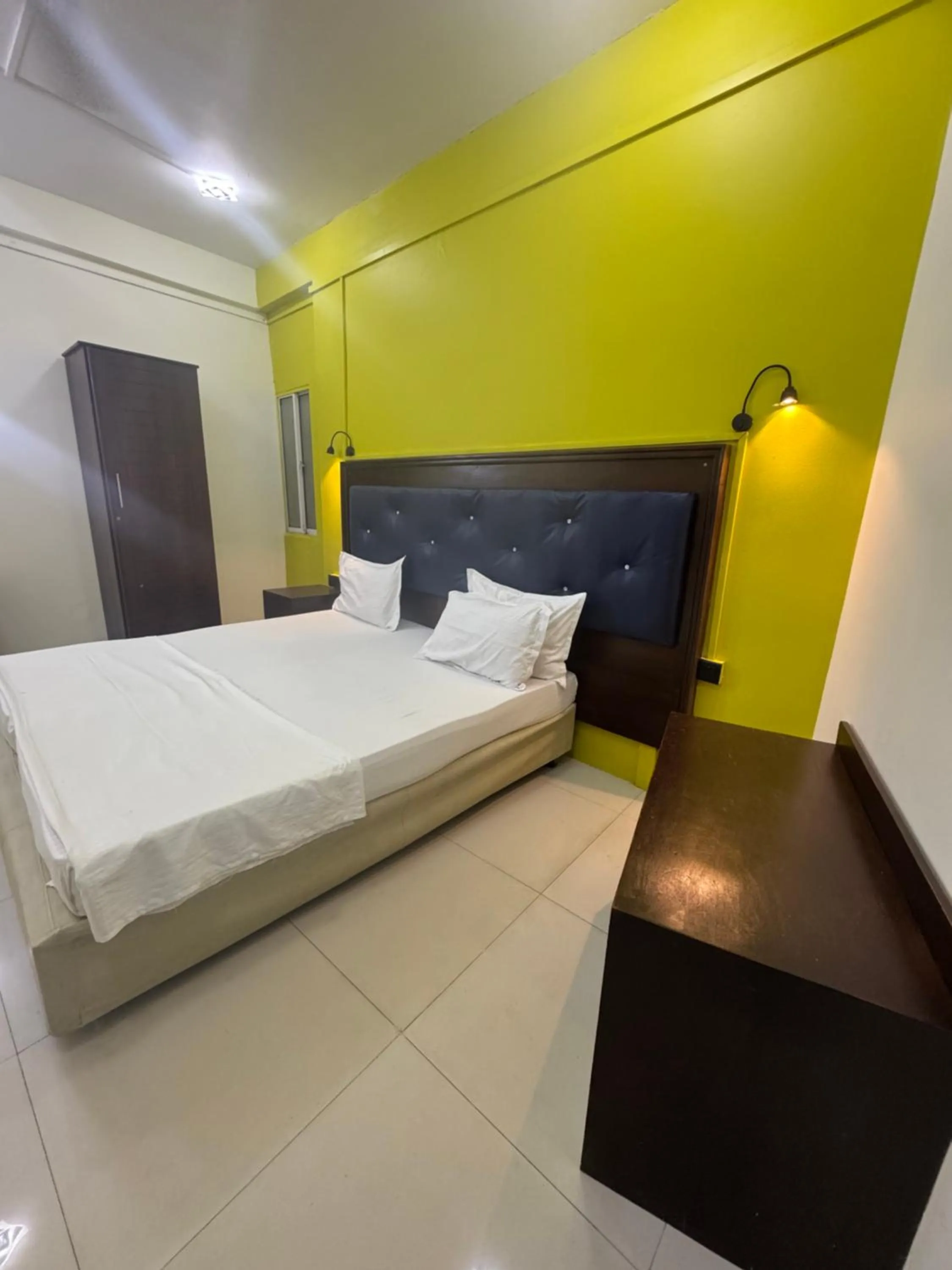 Bed in Metro City Hotel