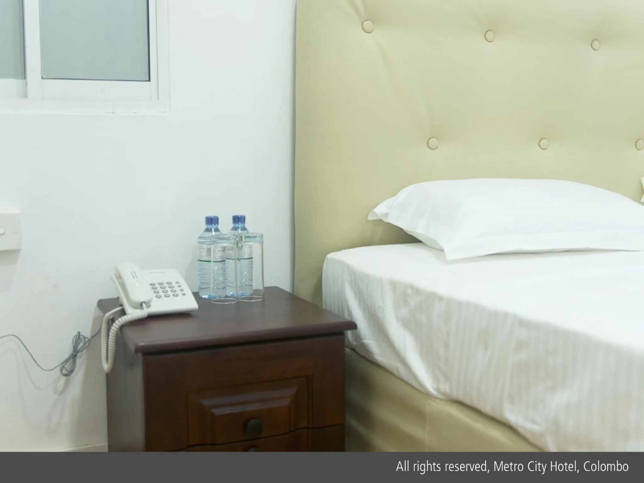 Bed in Metro City Hotel