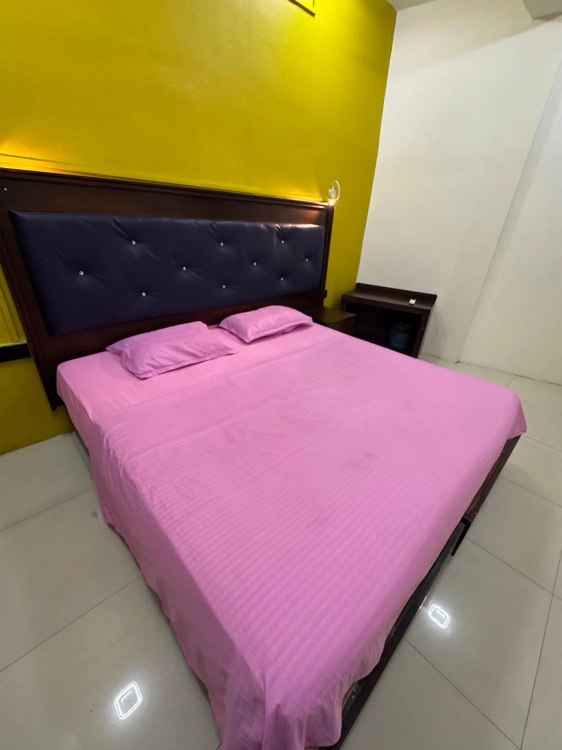 Bed in Metro City Hotel