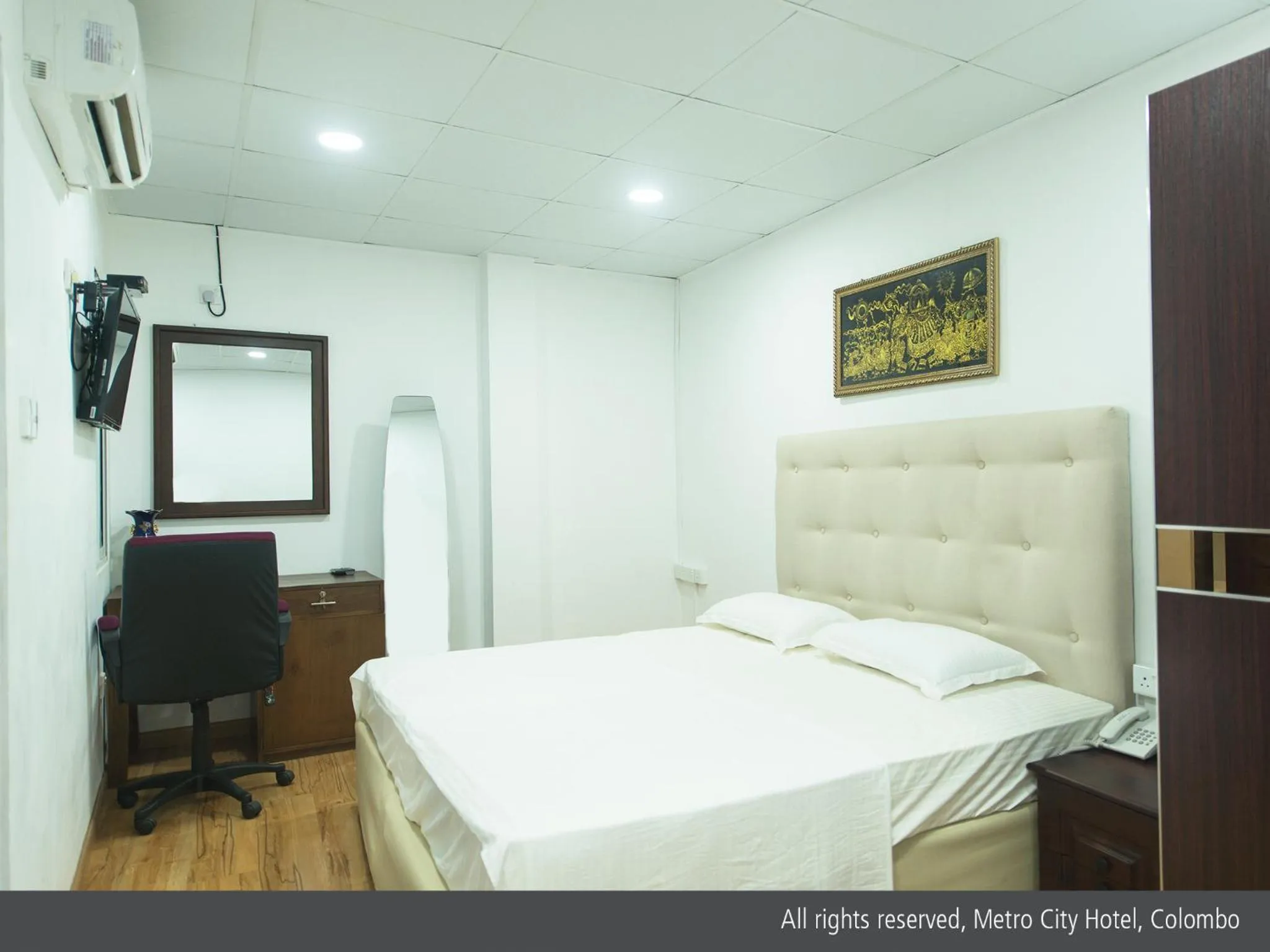 Bed in Metro City Hotel