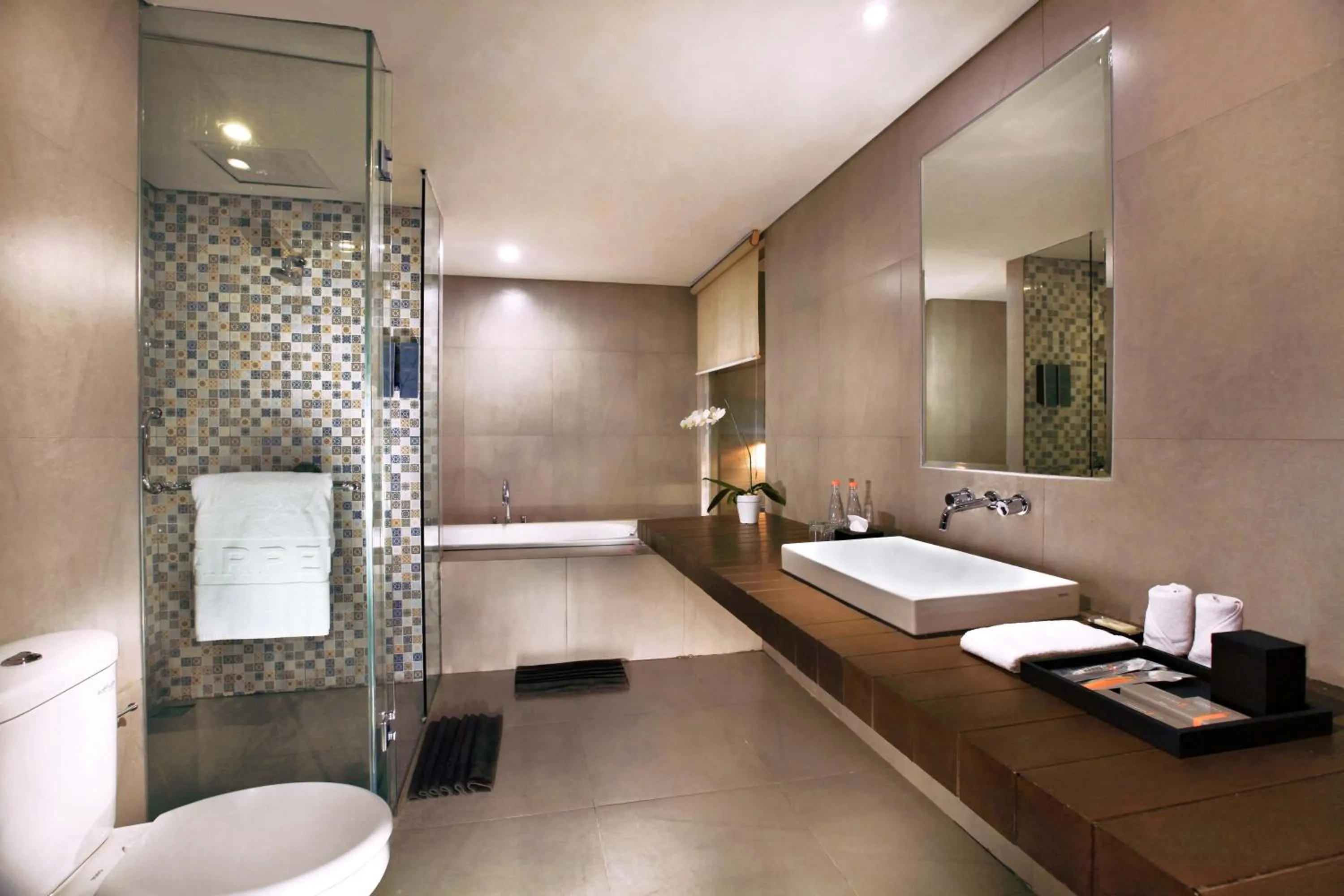 Bathroom in Harper Purwakarta by ASTON