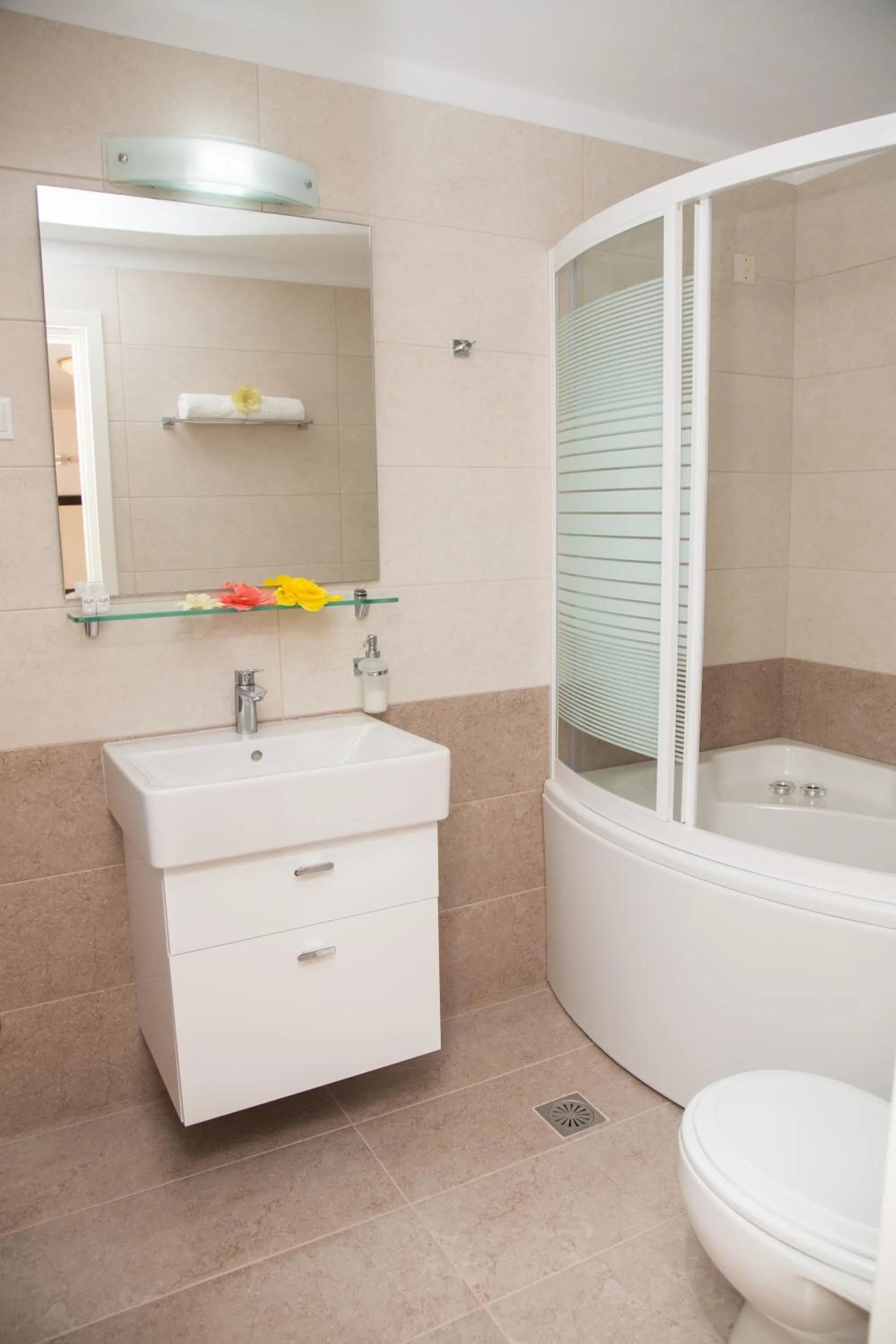 Bathroom in Brentanos Apartments - A - View of Paradise