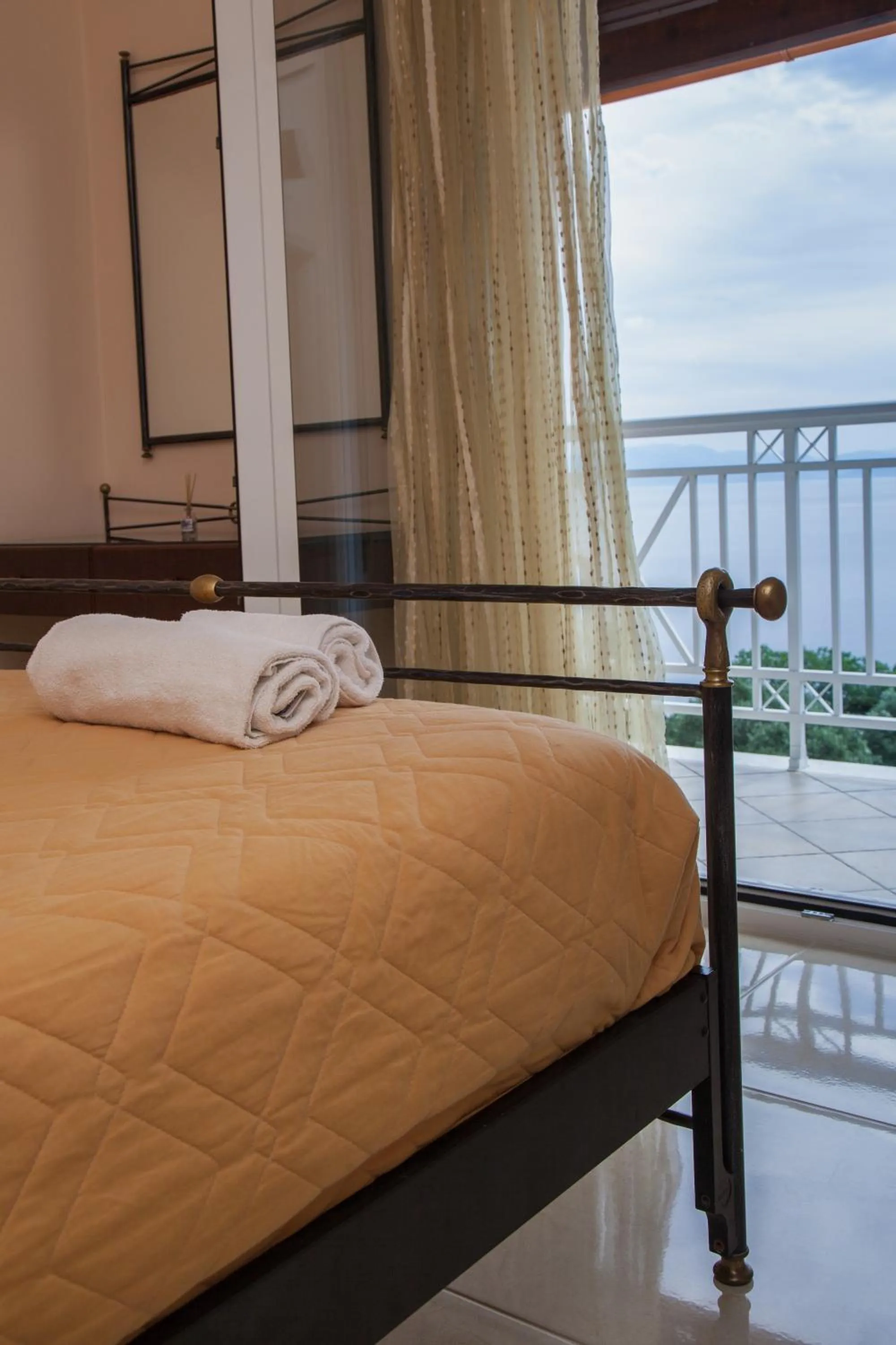 Bedroom, Bed in Brentanos Apartments - A - View of Paradise