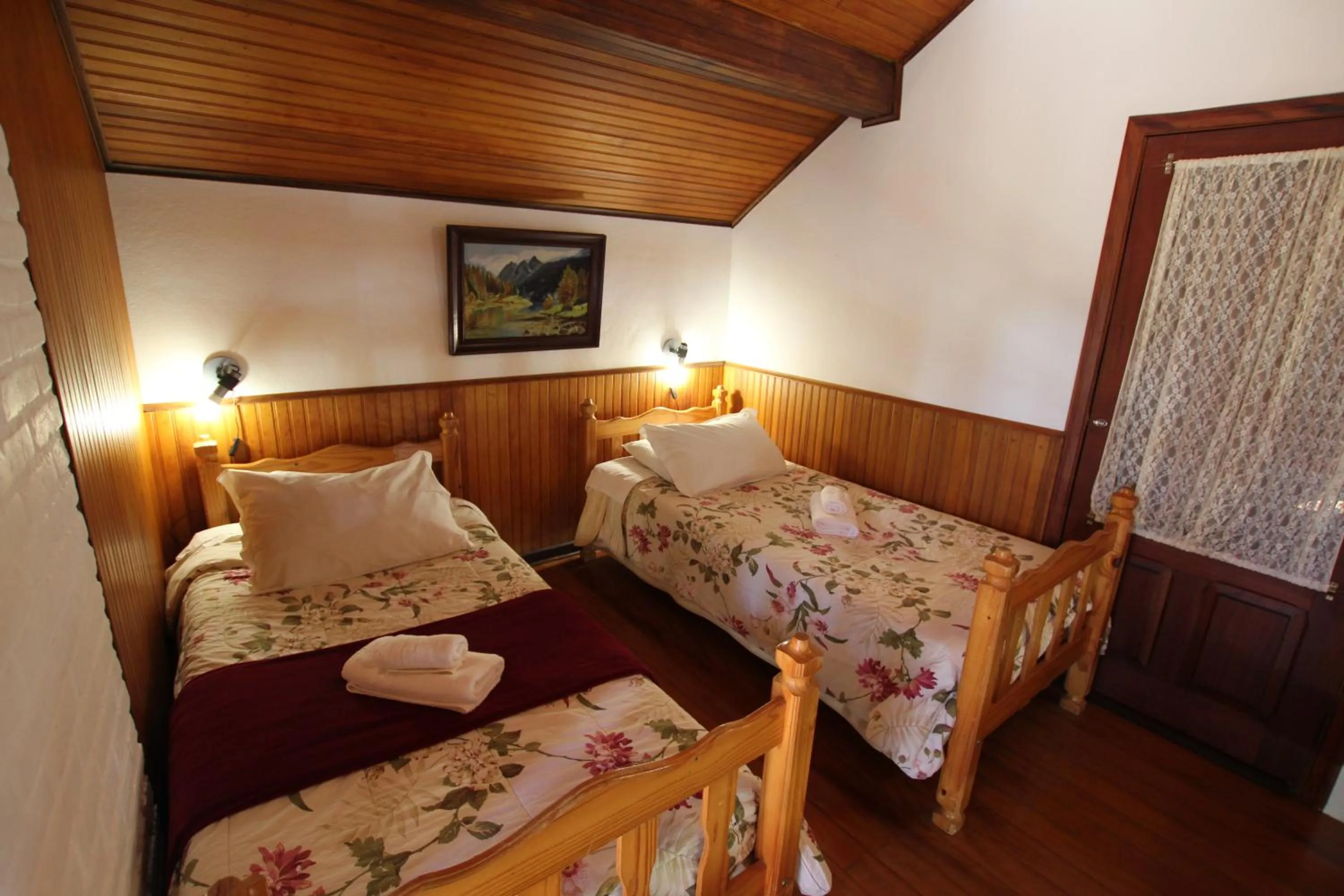 Bed in Pousada Aguia da Montanha