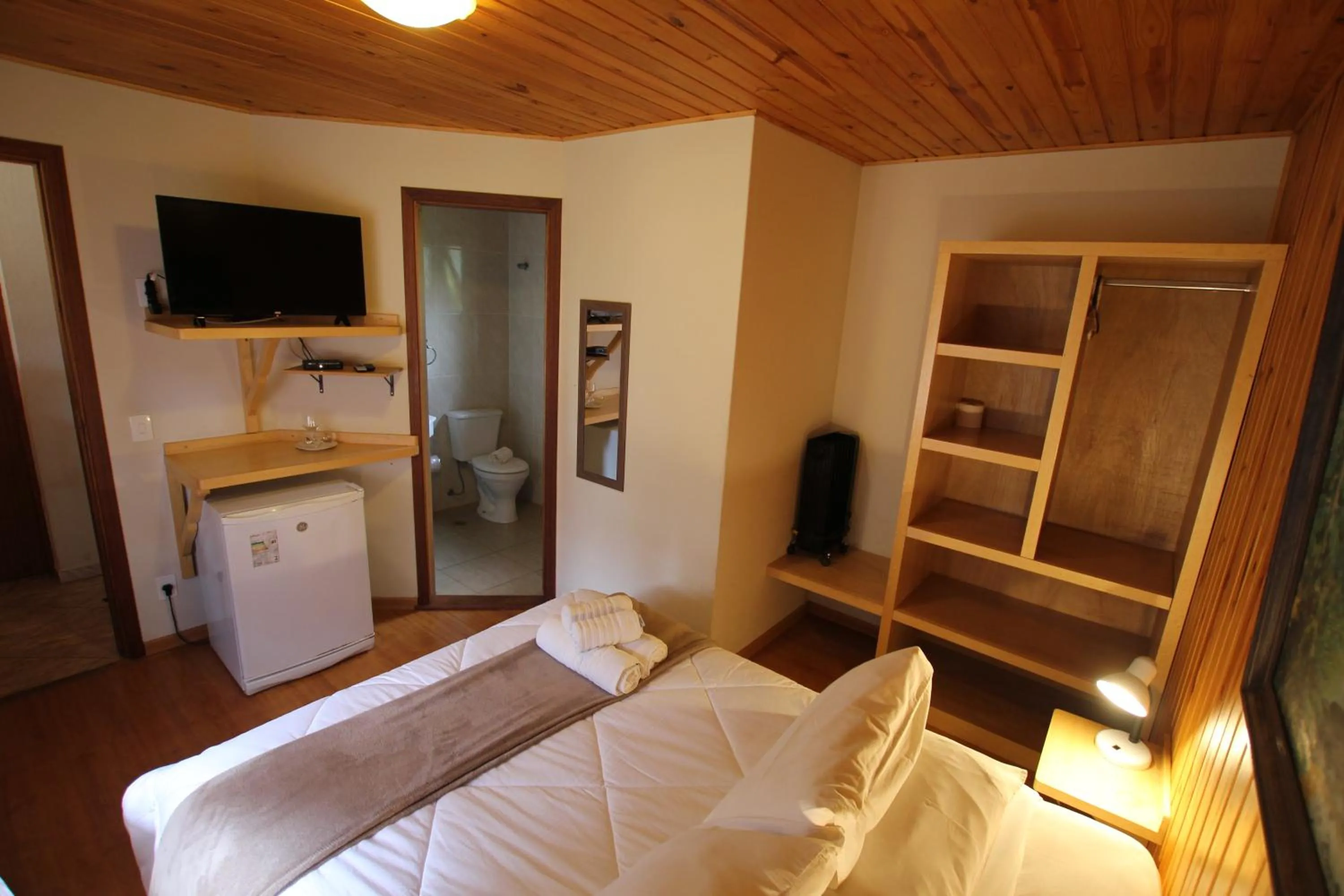 Bed in Pousada Aguia da Montanha