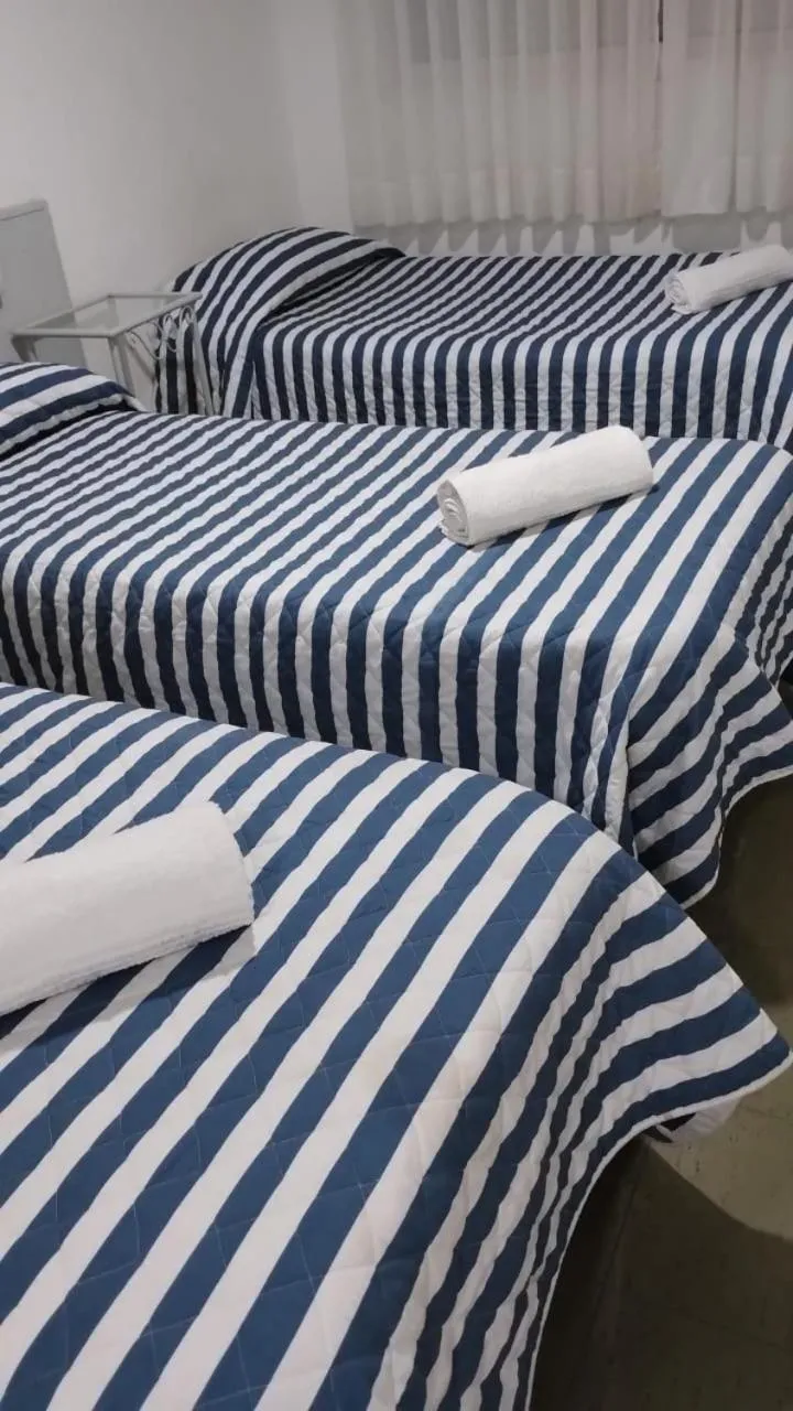 Bed in Hotel Delfin