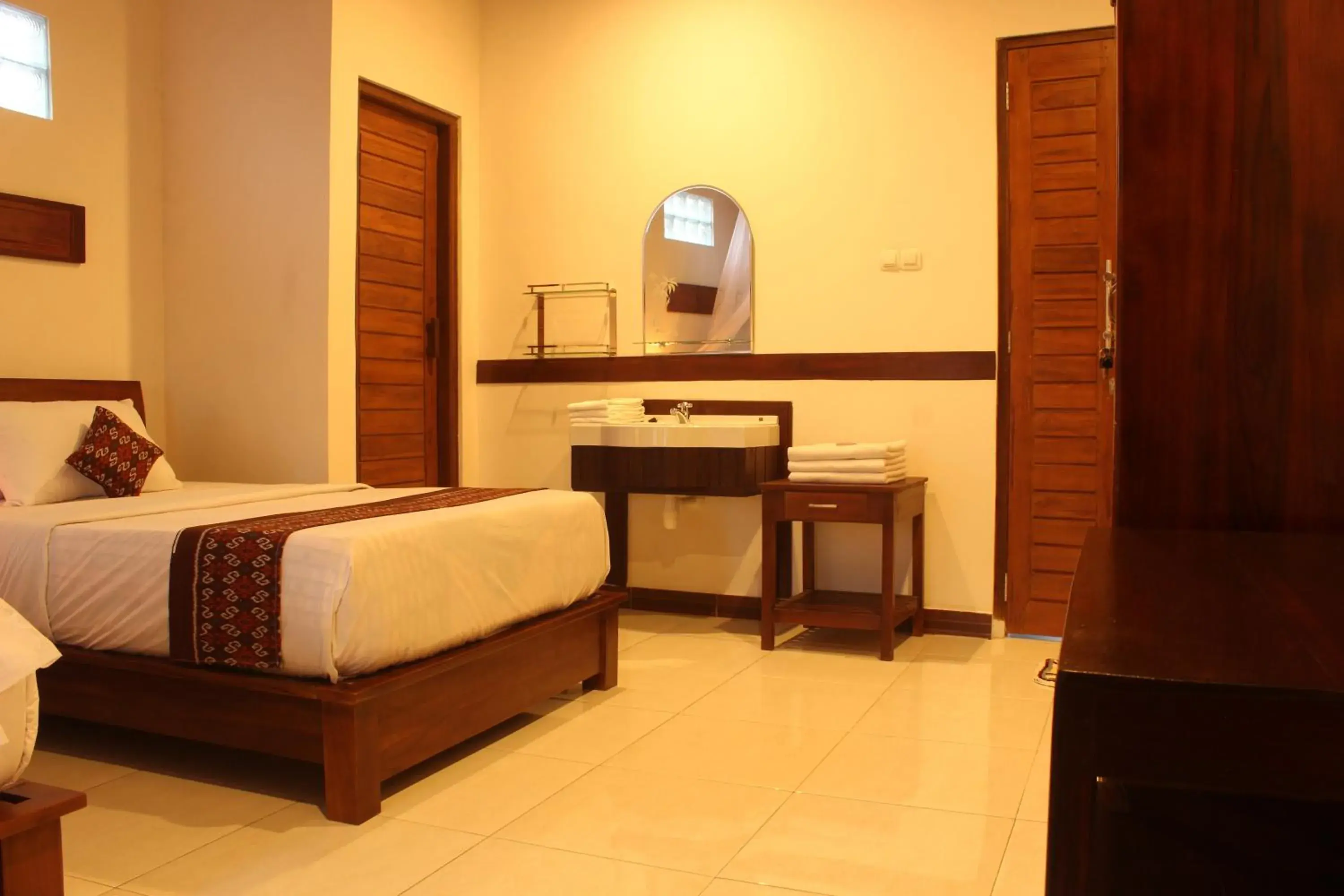 Deluxe Triple Room in Maliana Homestay Deluxe Triple Room in Maliana Homestay