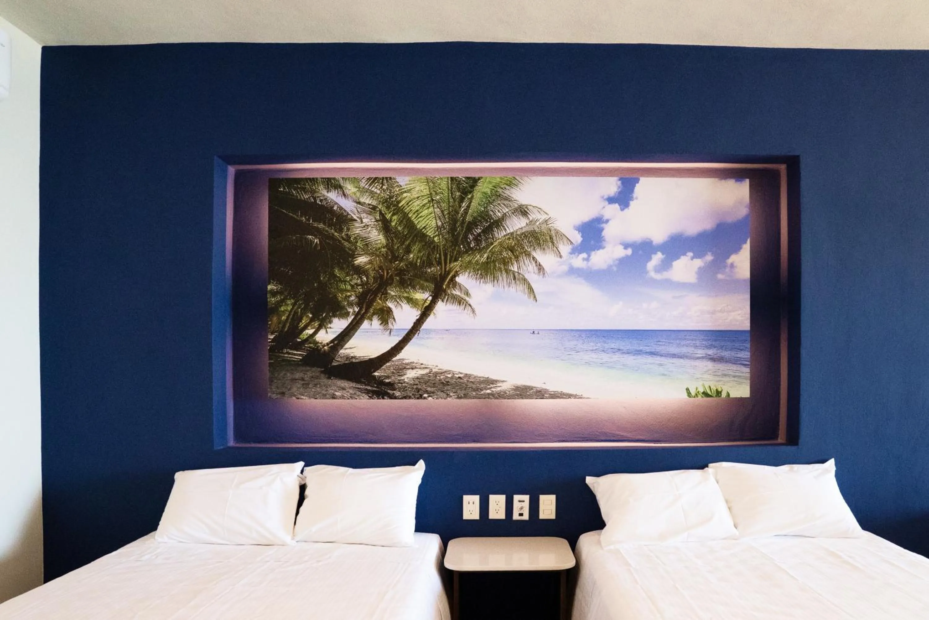 Bed in Avenir Armonia Suites