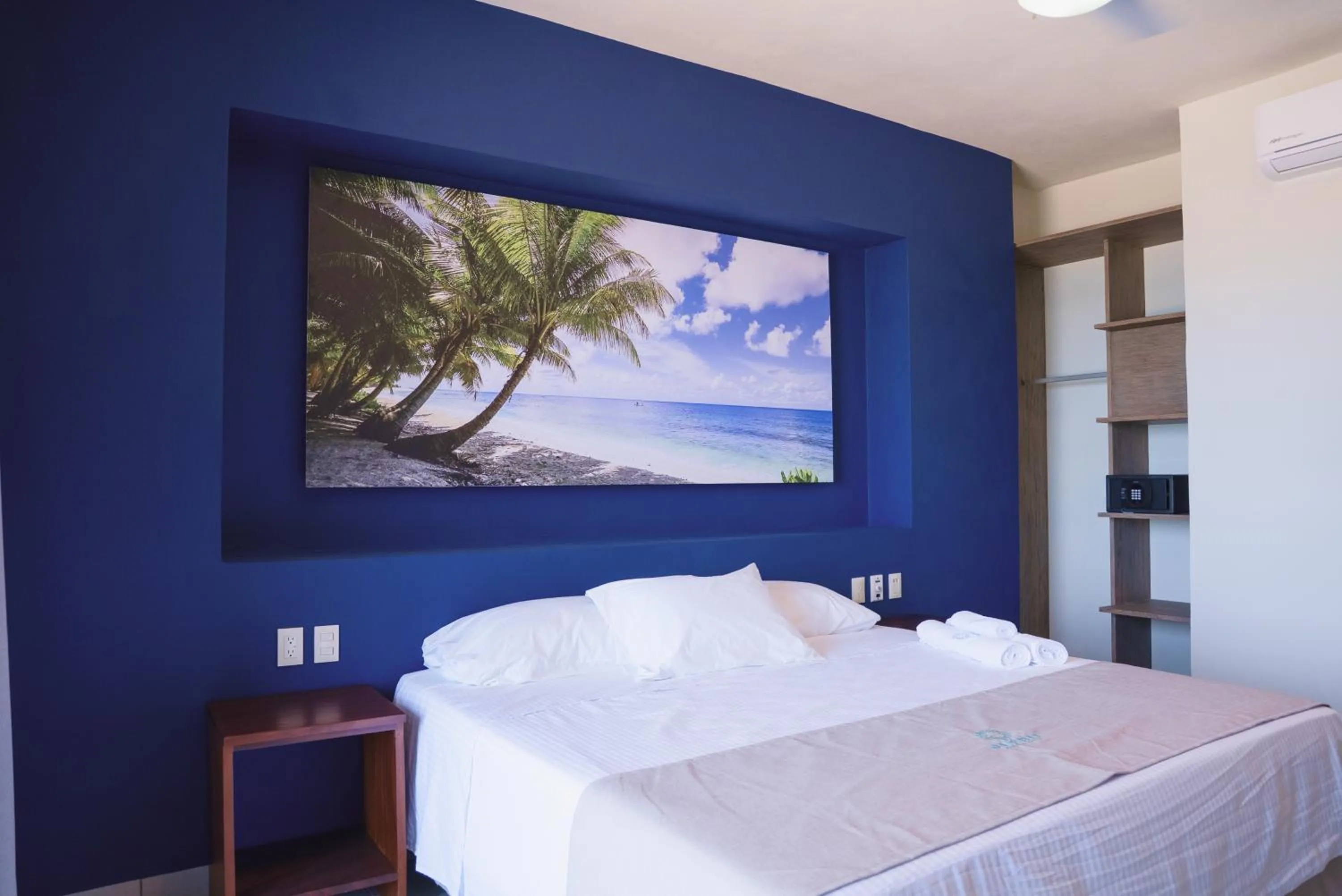 Bed in Avenir Armonia Suites