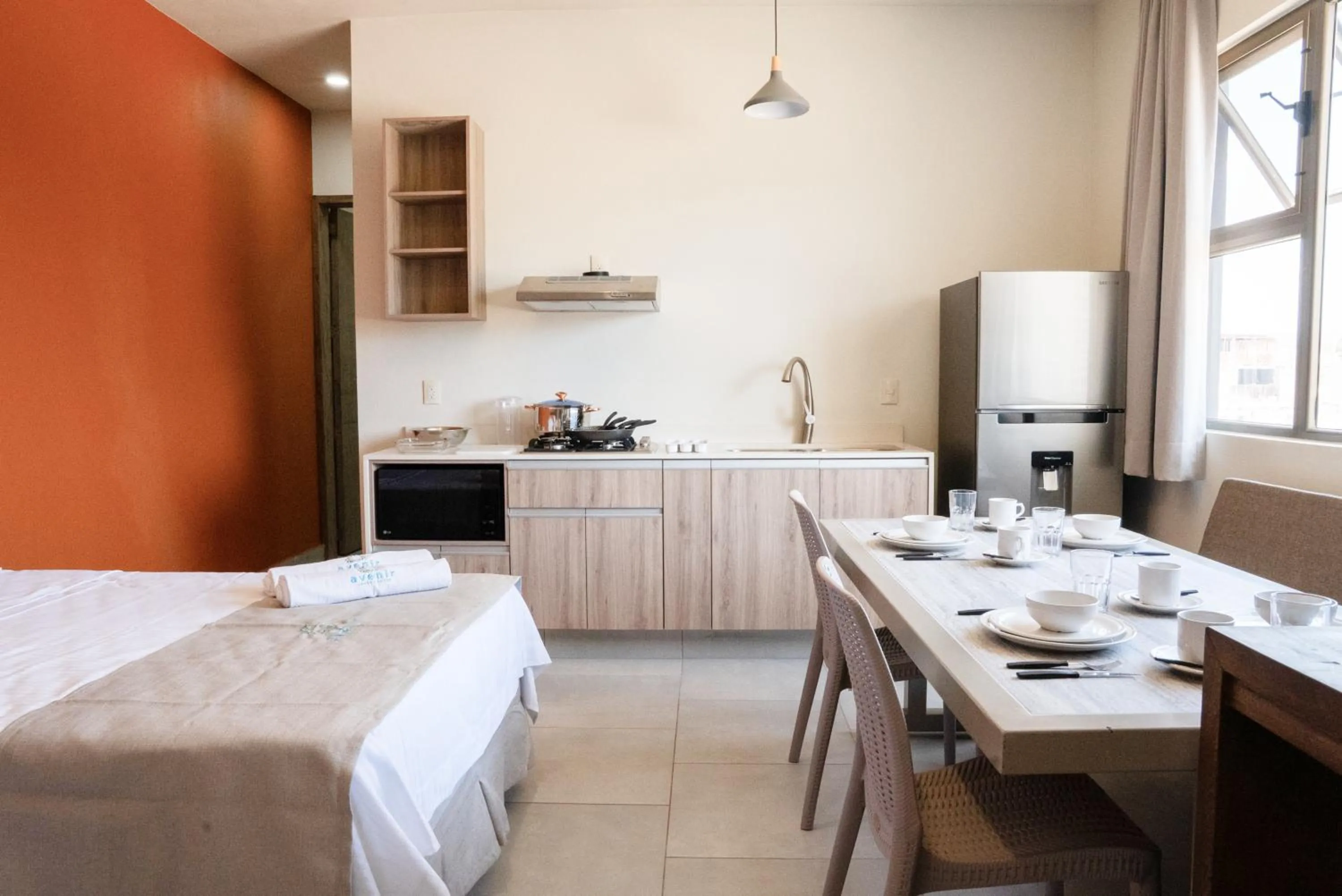 Bed in Avenir Armonia Suites