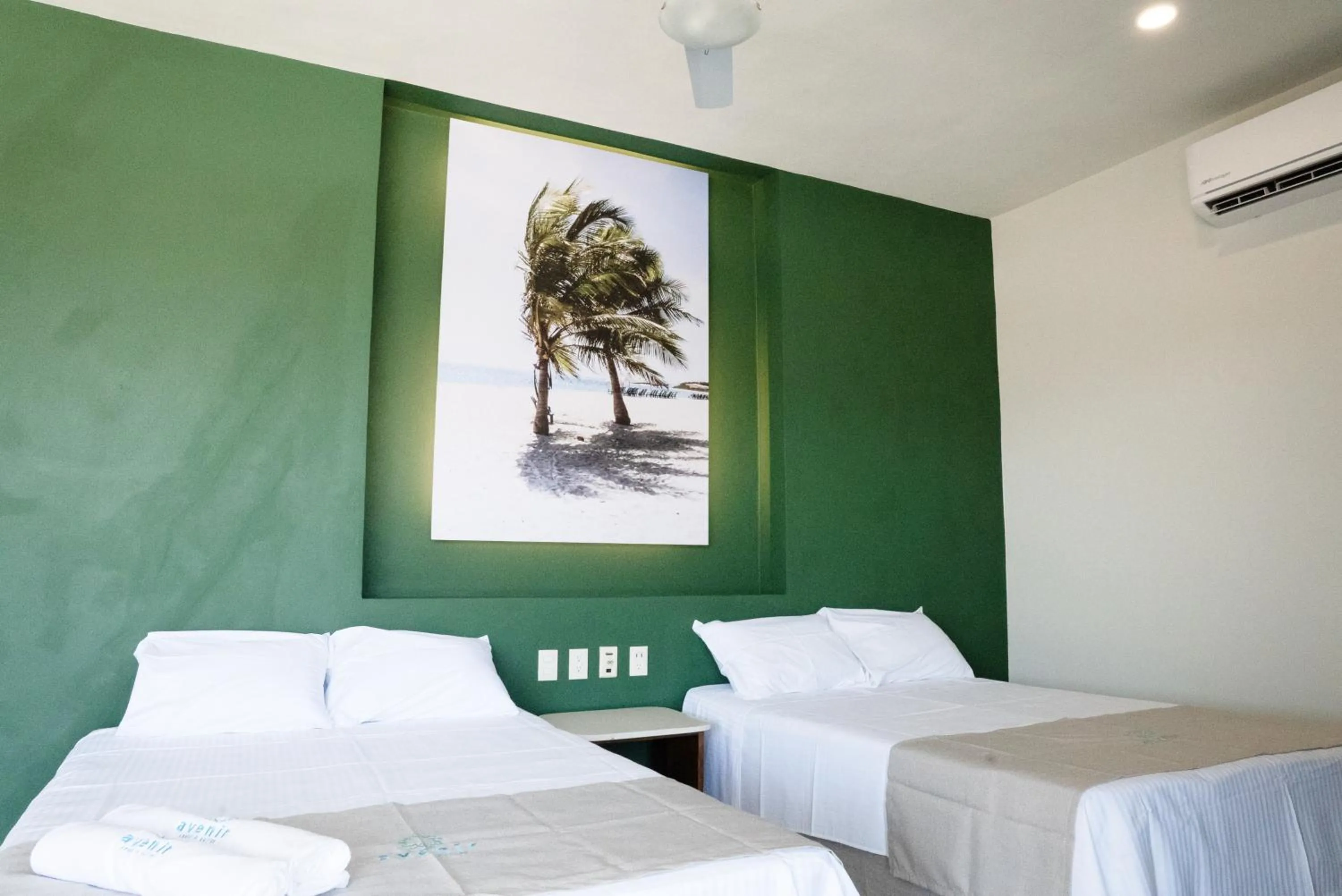 Bed in Avenir Armonia Suites