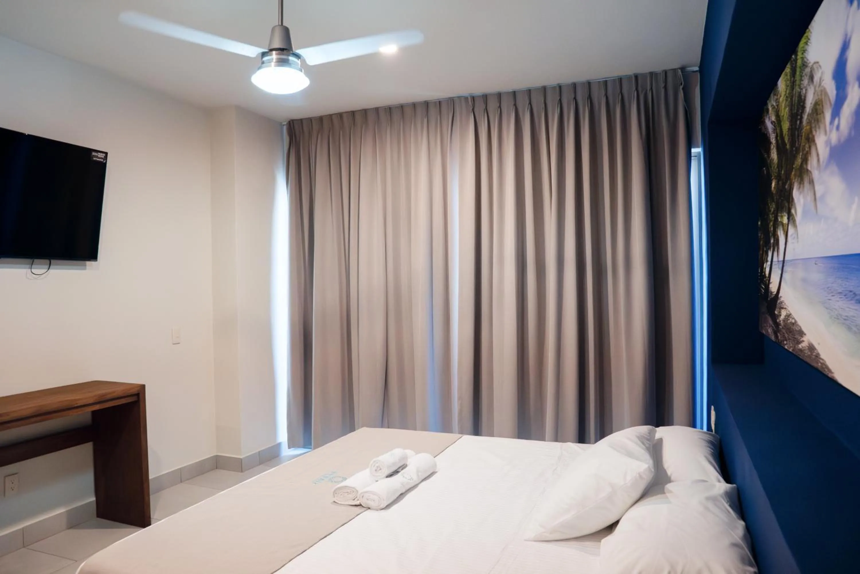 Bed in Avenir Armonia Suites