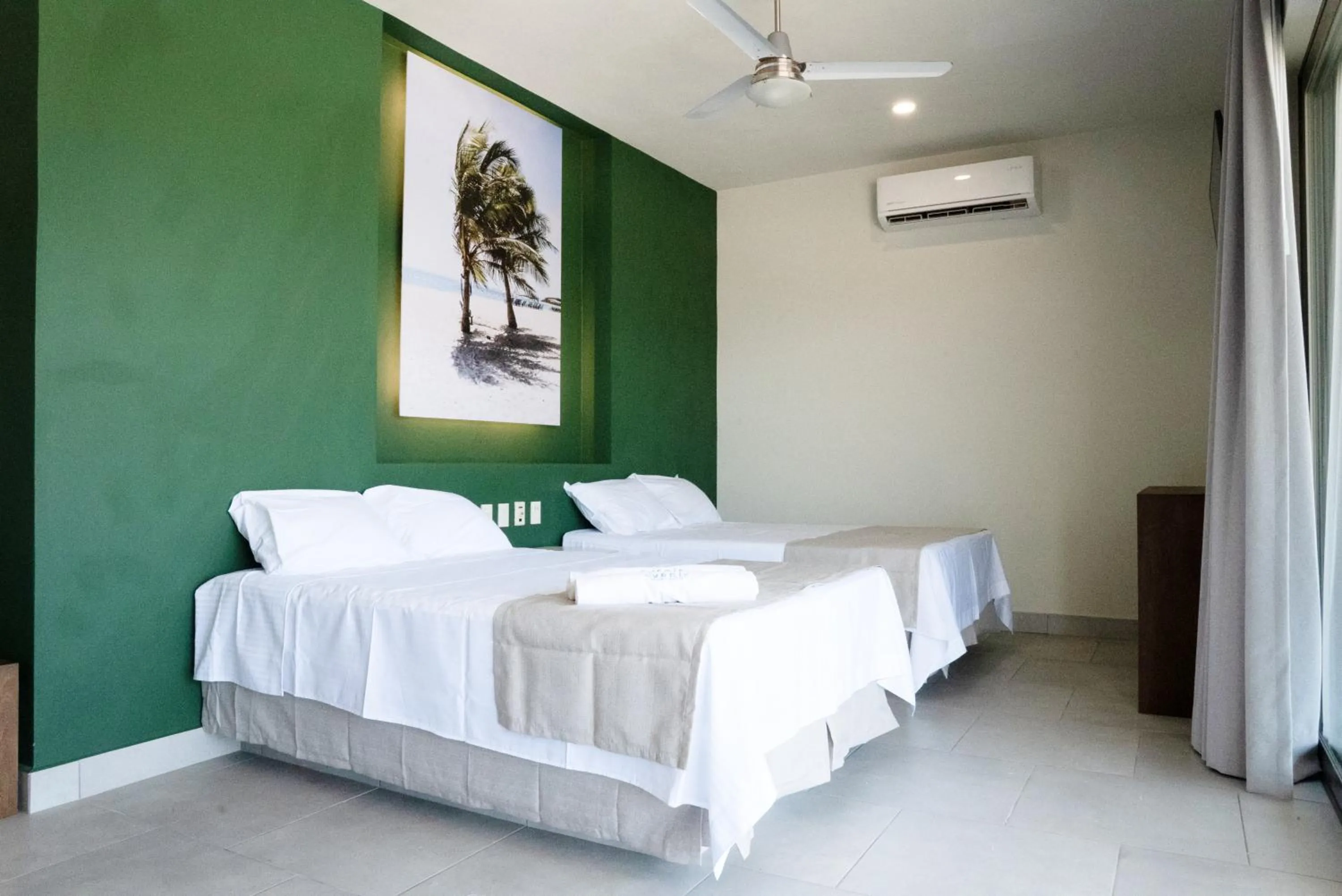Bed in Avenir Armonia Suites