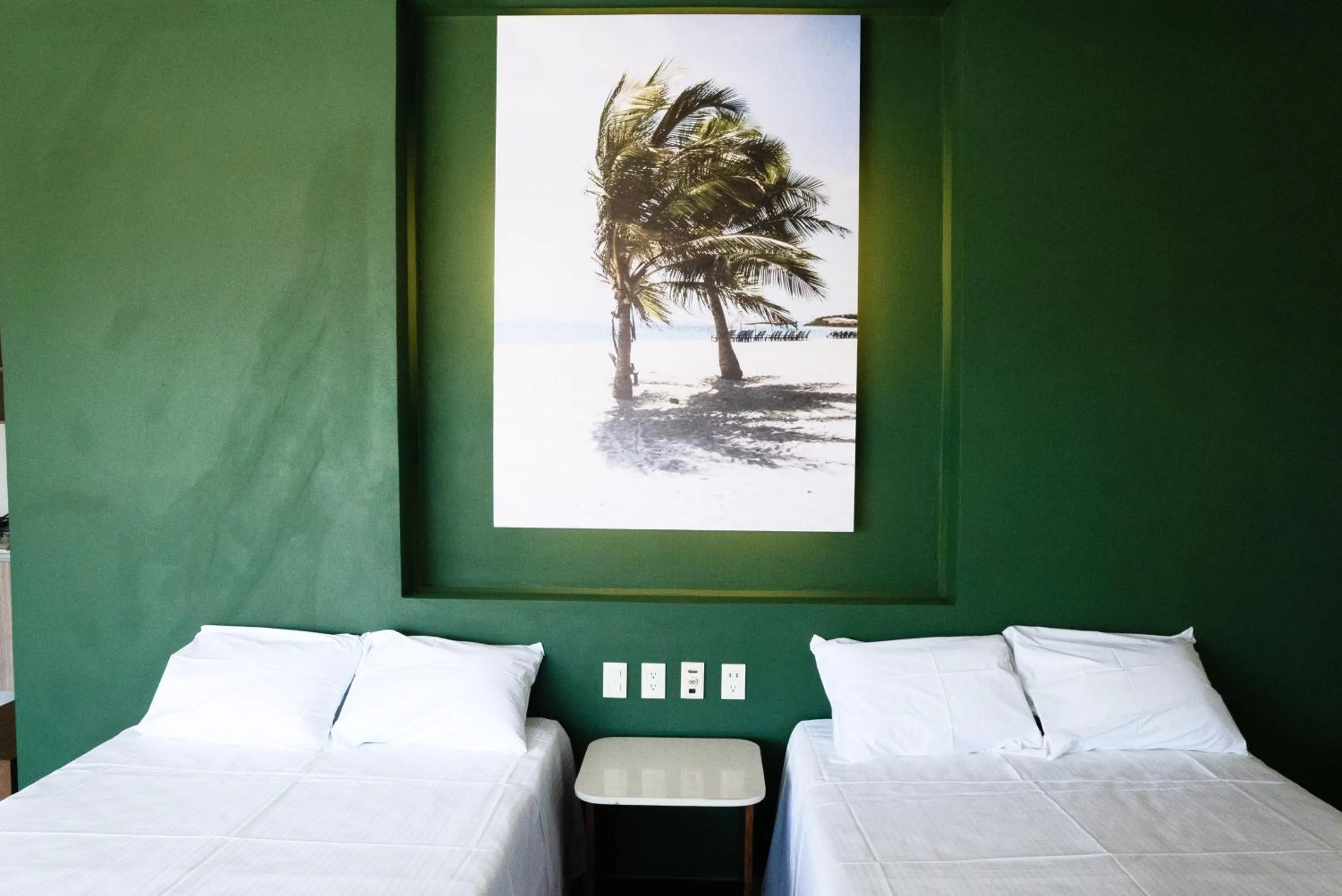 Bed in Avenir Armonia Suites