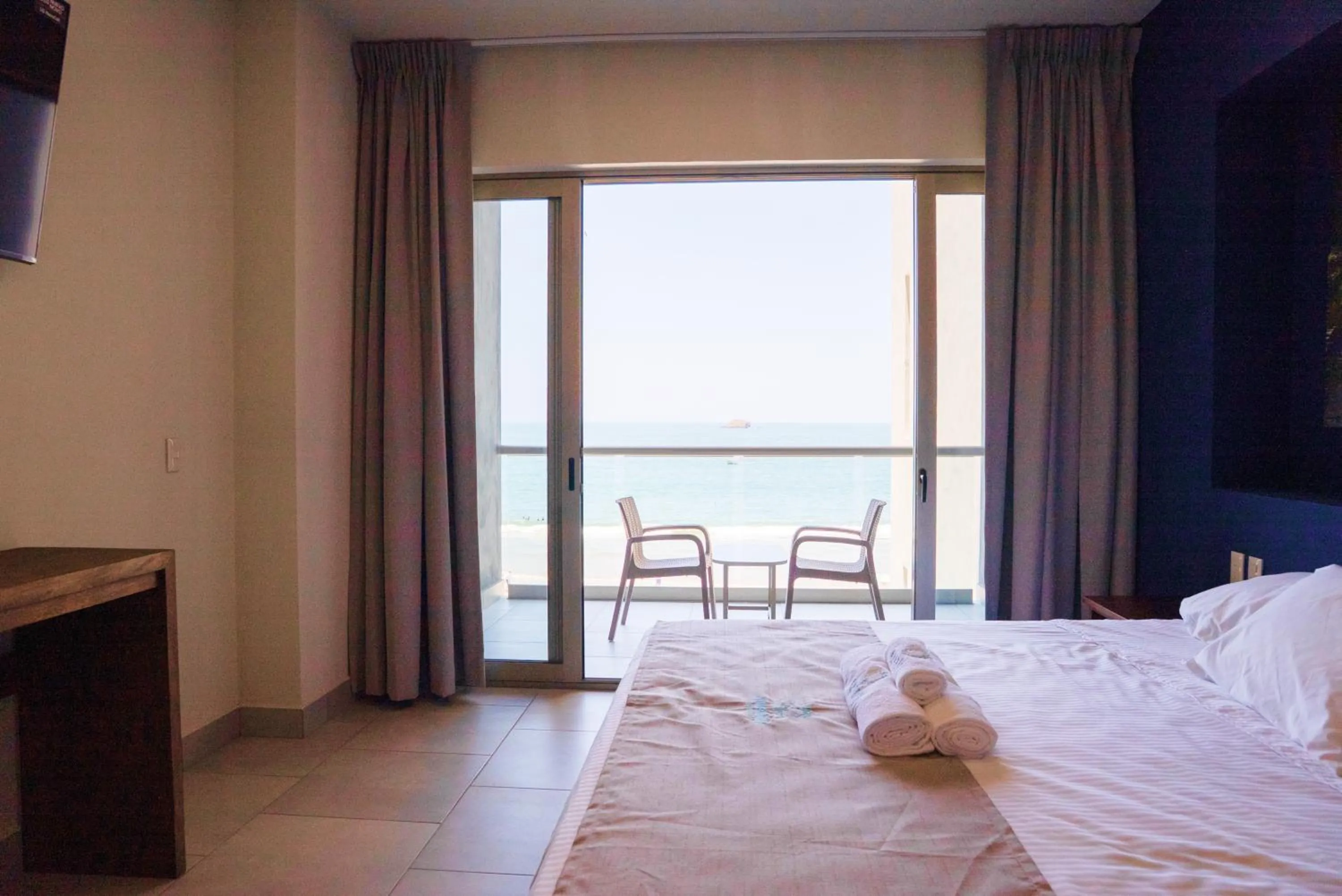 Bed in Avenir Armonia Suites