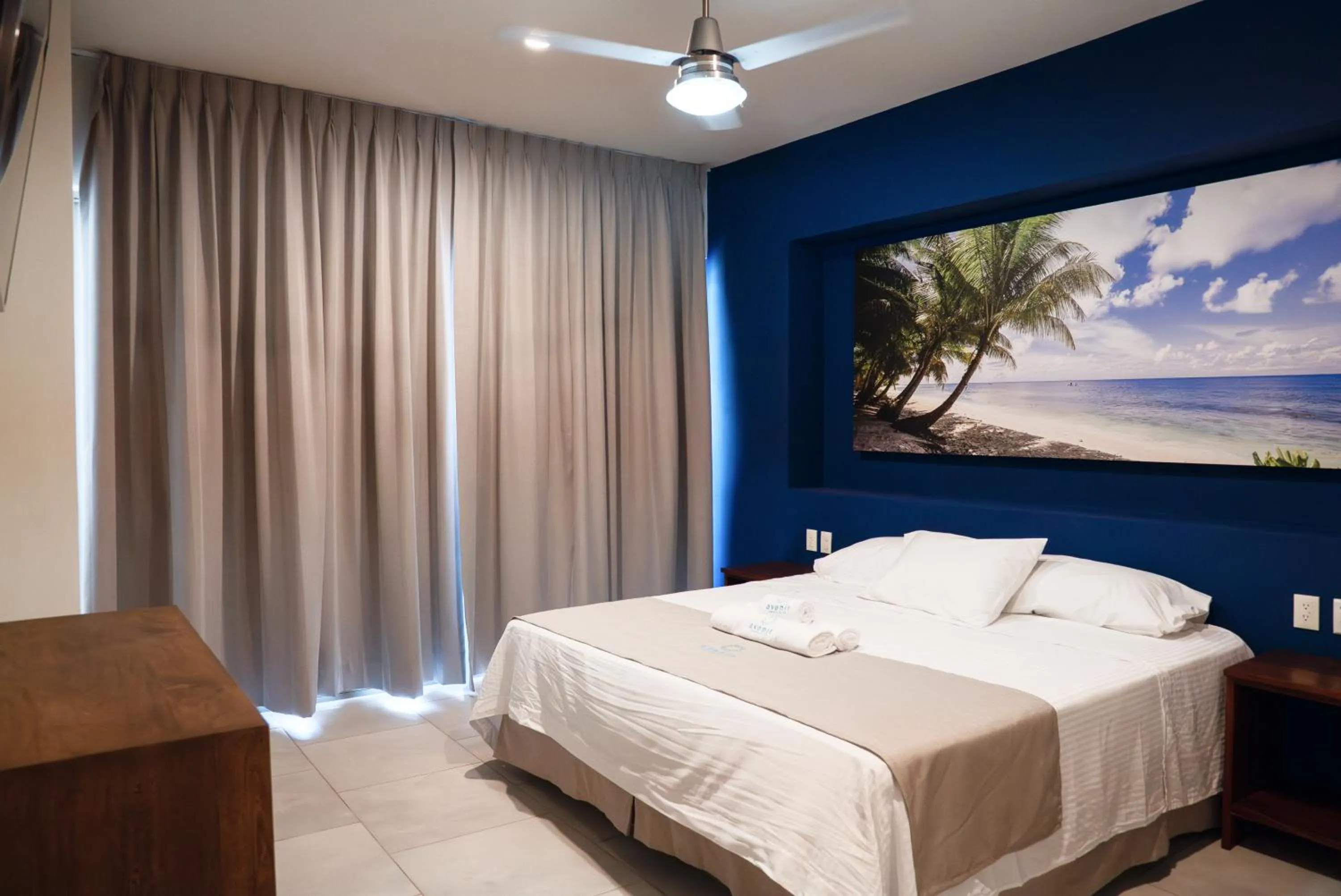 Bed in Avenir Armonia Suites