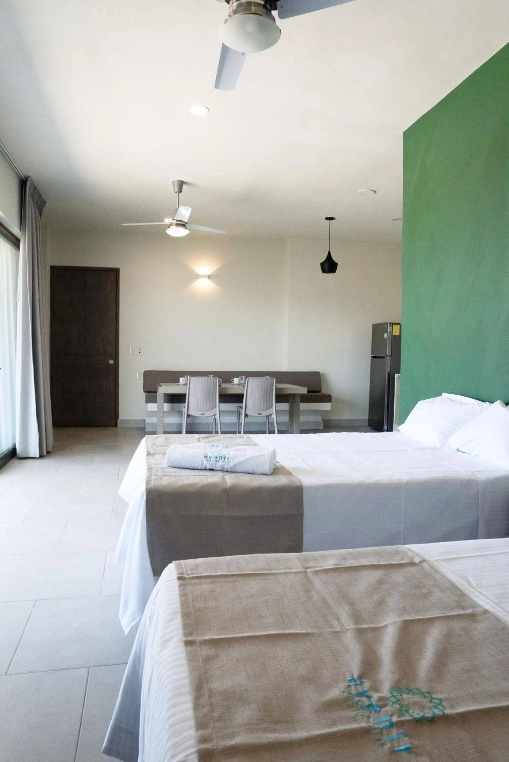 Bed in Avenir Armonia Suites