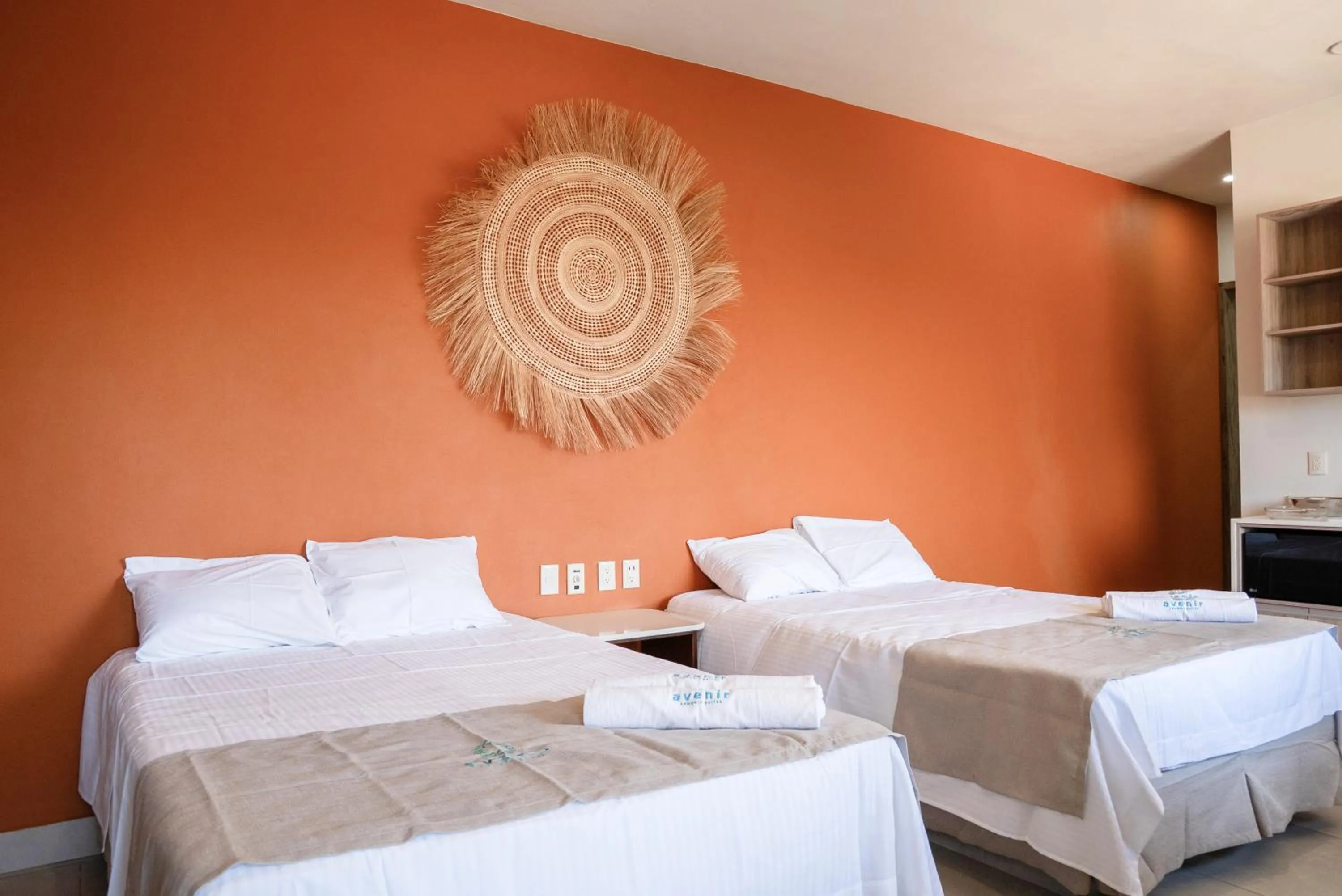 Bed in Avenir Armonia Suites