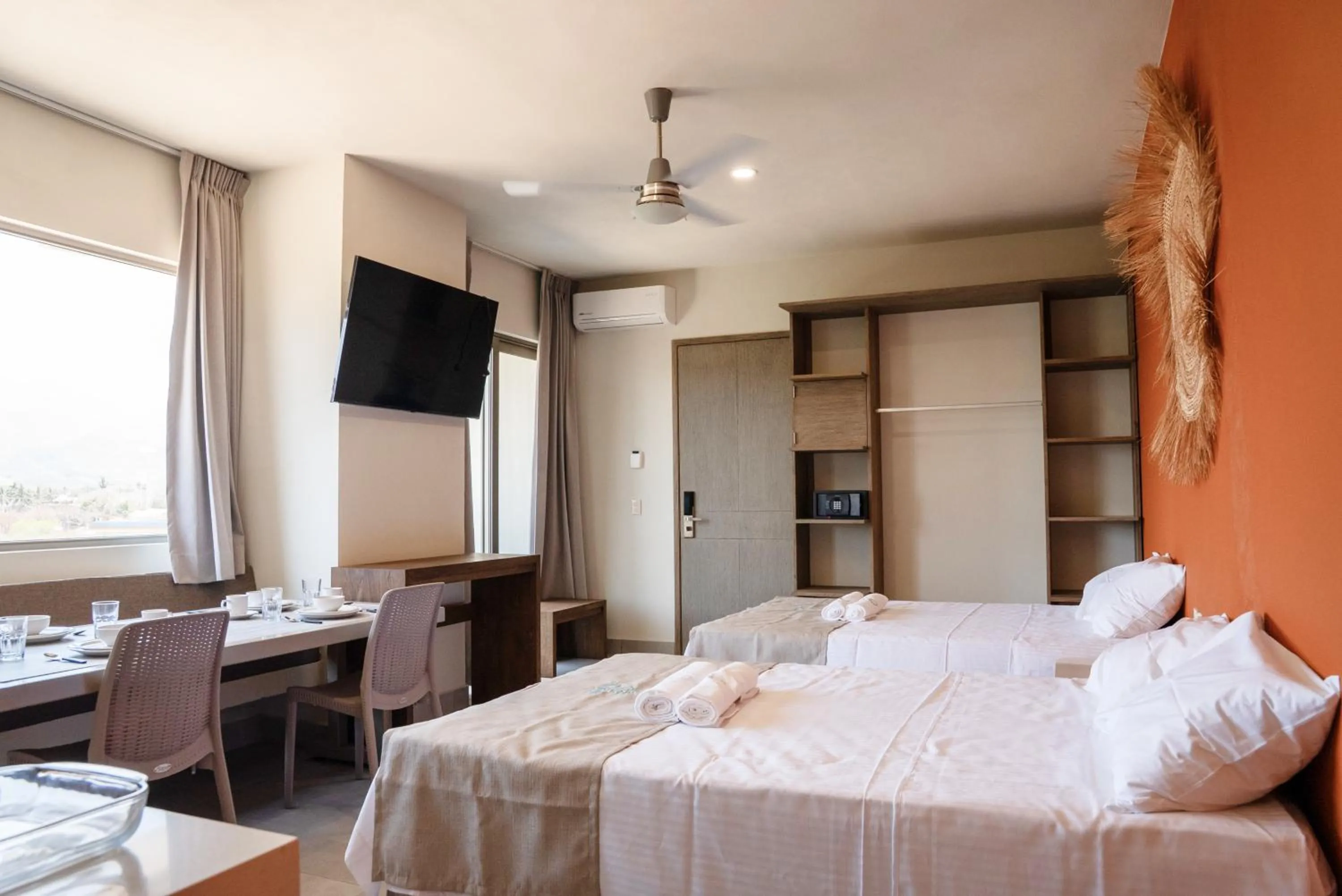 Bed in Avenir Armonia Suites