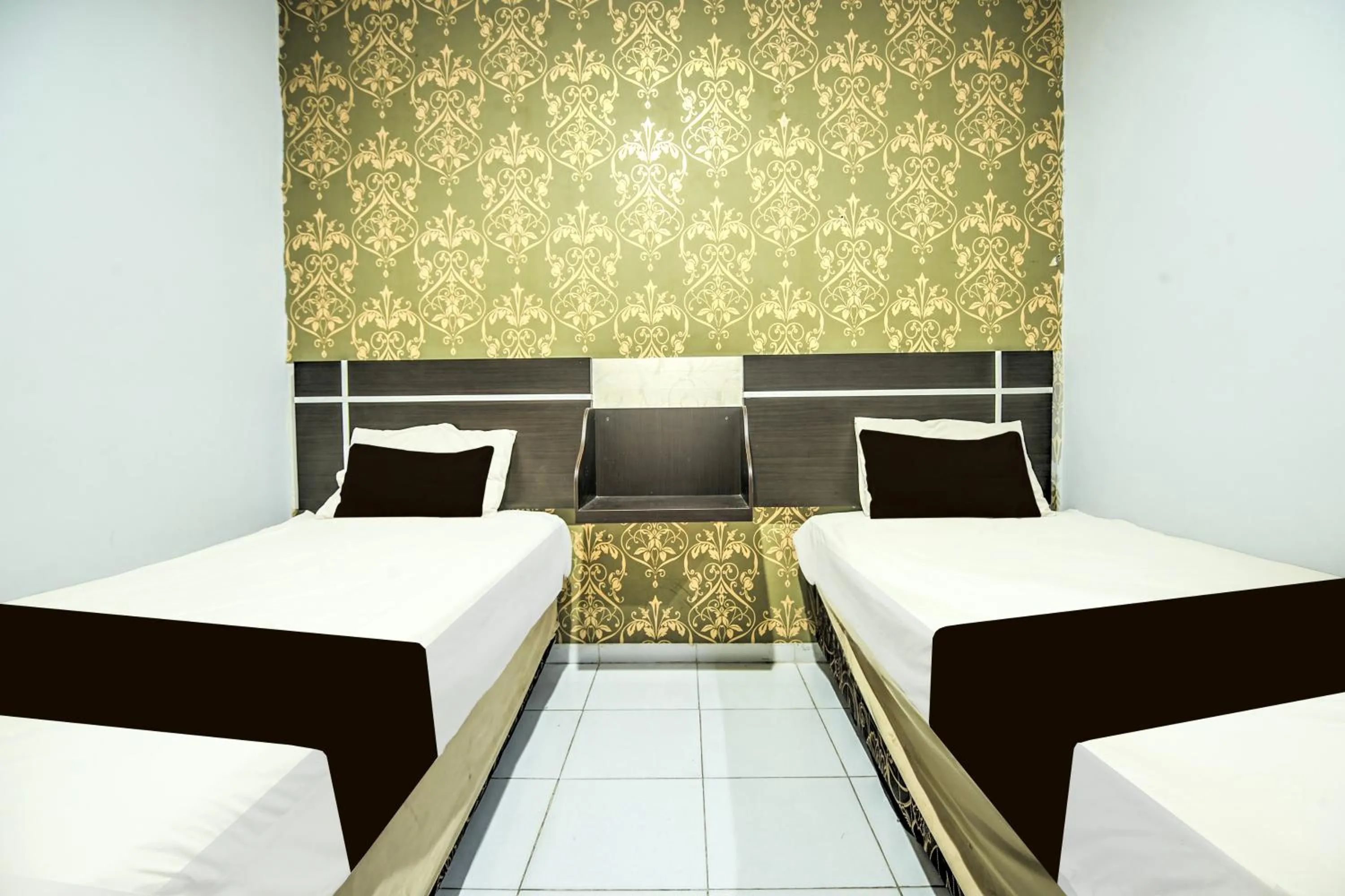 Delxue Twin Room in Hotel O Makassar near Mall Panakukang formerly Hotel Lucky Inn Makassar