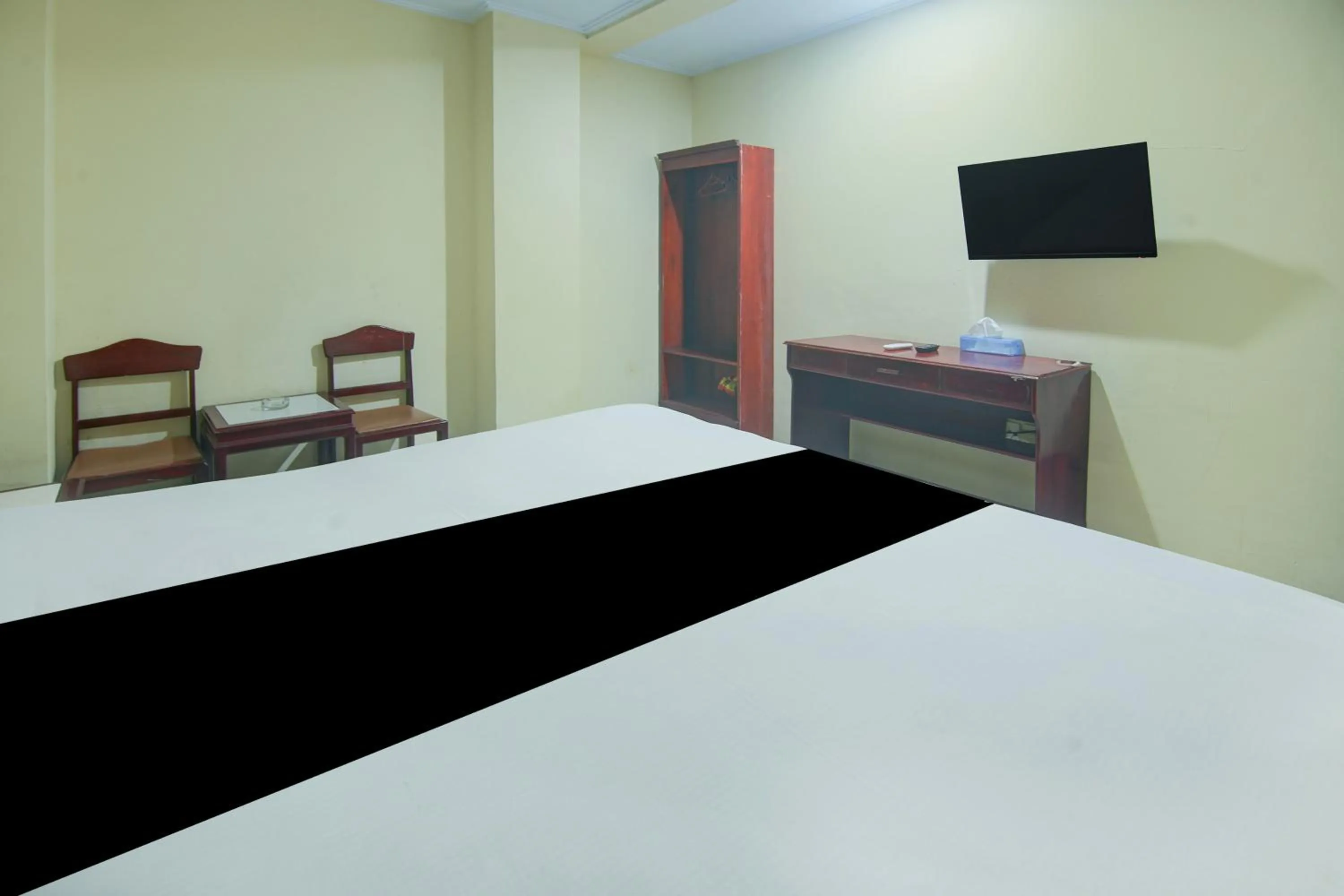 Bedroom, Bed in Hotel O Makassar near Pantai Losari formerly Hotel Tiara Sari