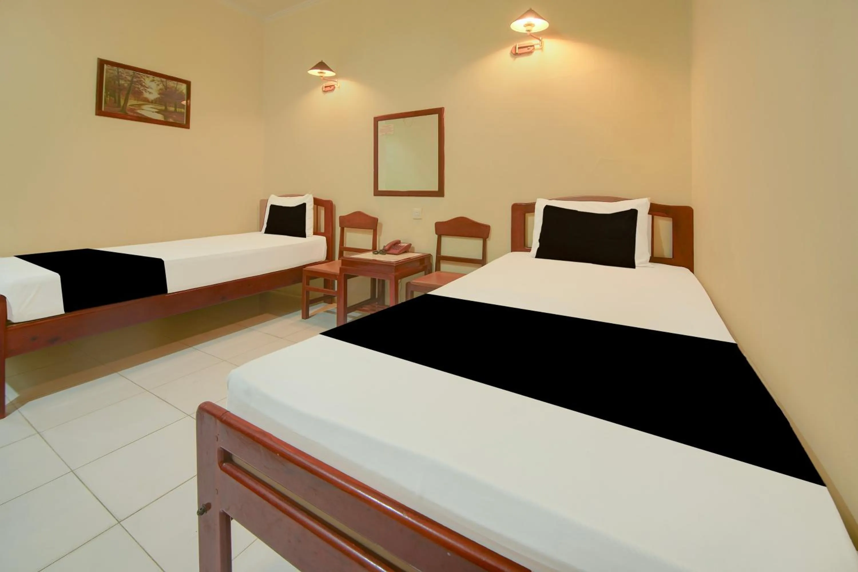 Bedroom, Bed in Hotel O Makassar near Pantai Losari formerly Hotel Tiara Sari