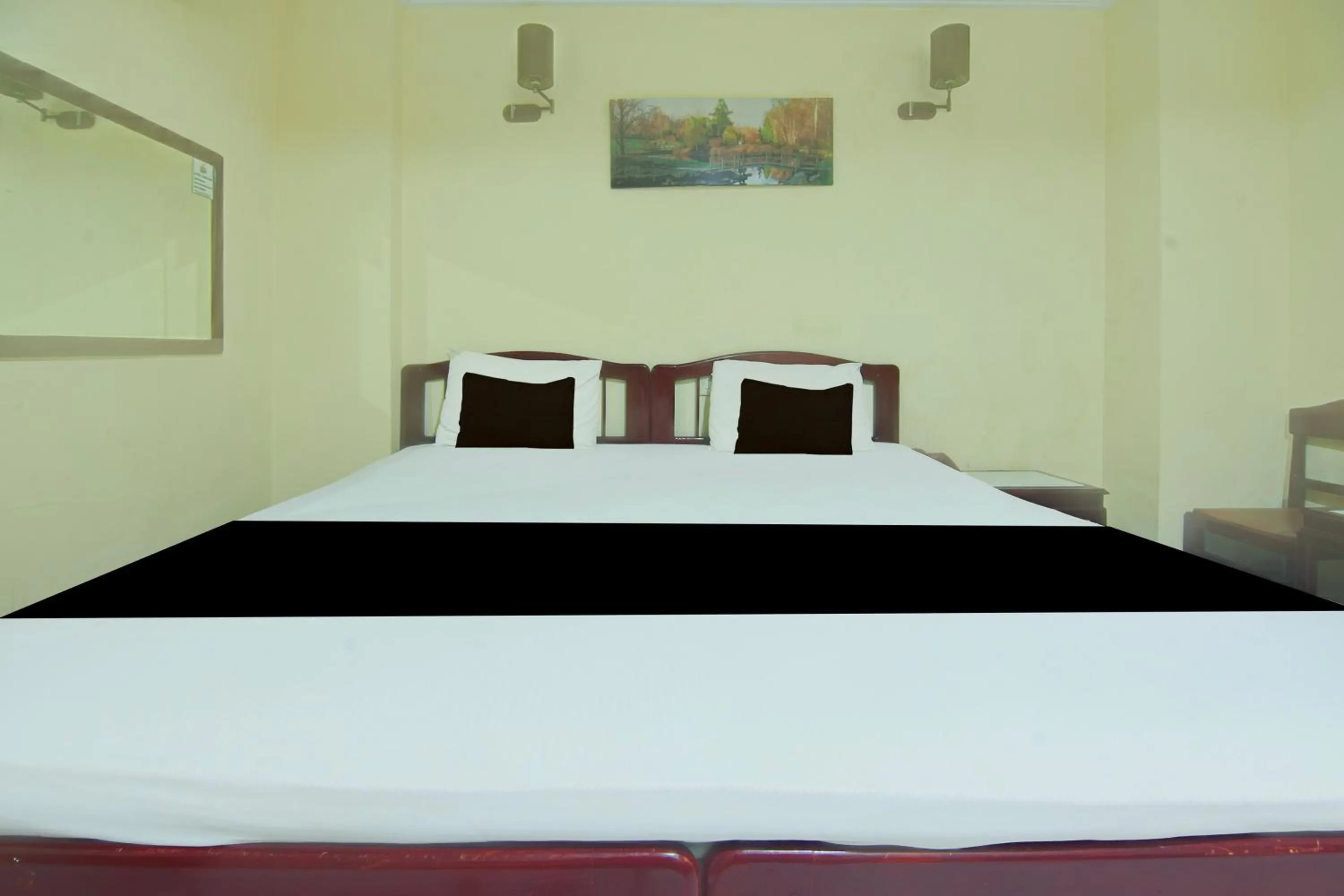 Bedroom, Bed in Hotel O Makassar near Pantai Losari formerly Hotel Tiara Sari