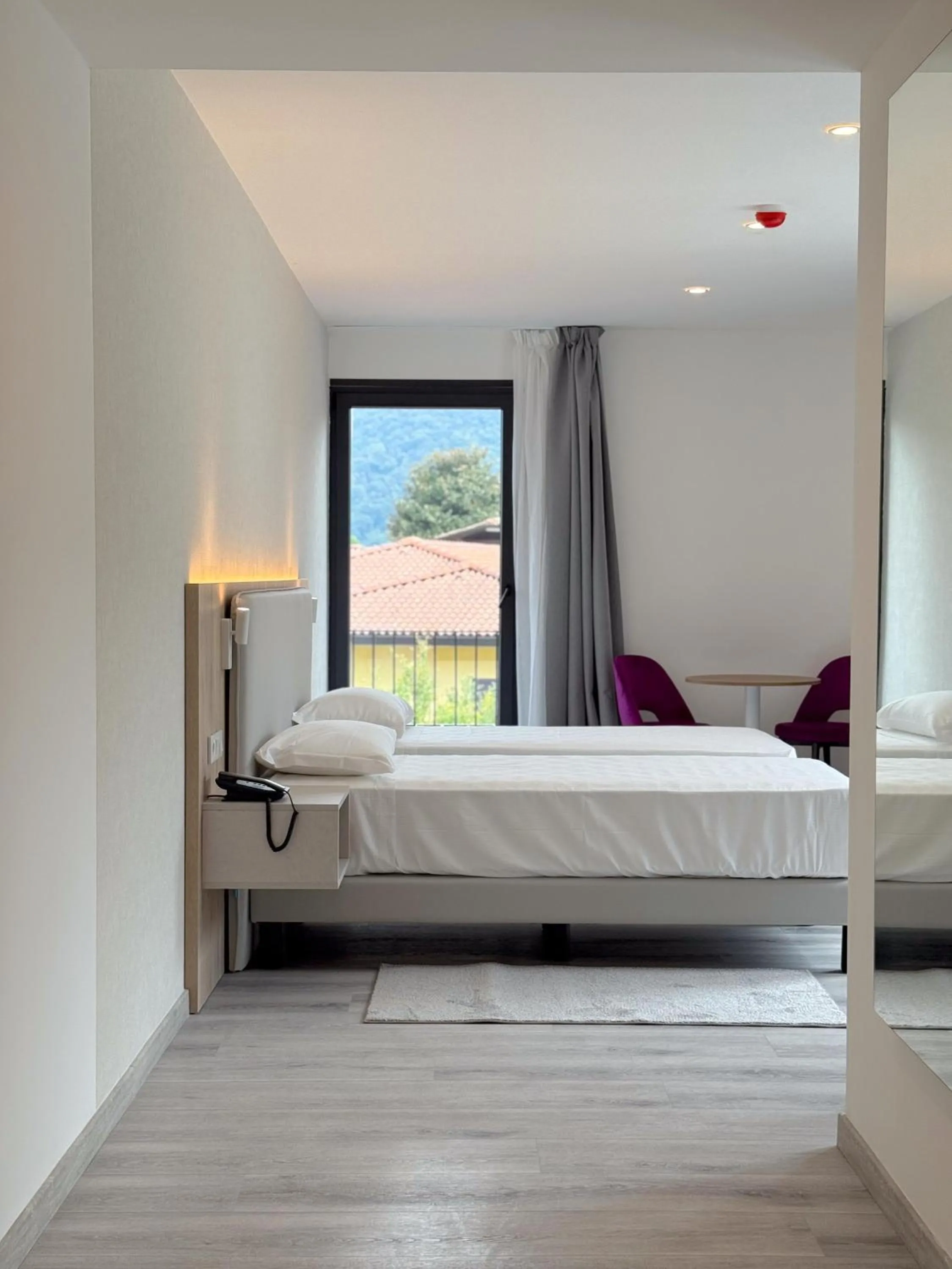 Bed in Lake & More Suite Hotel