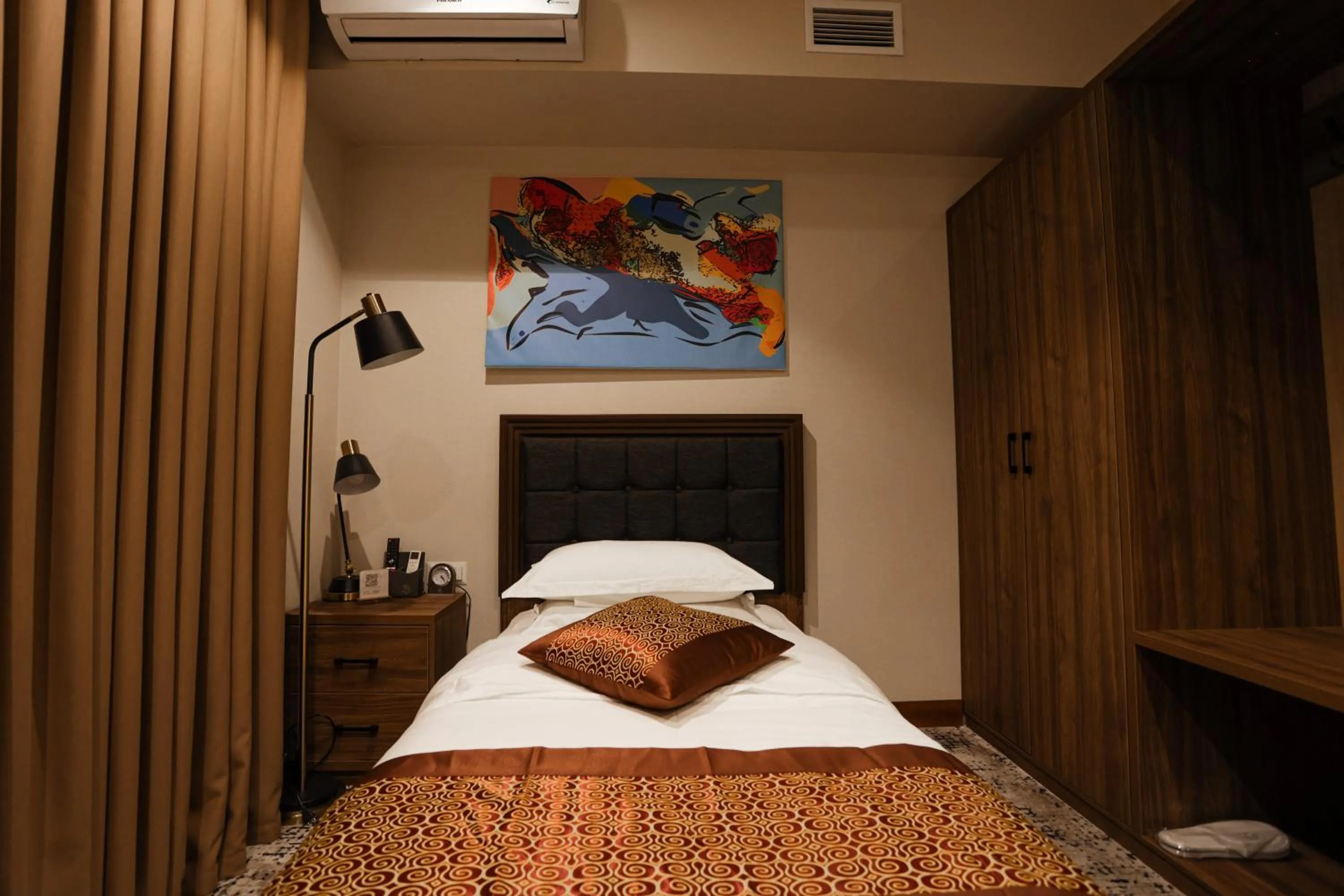 Bed in Bogishamol Hotel