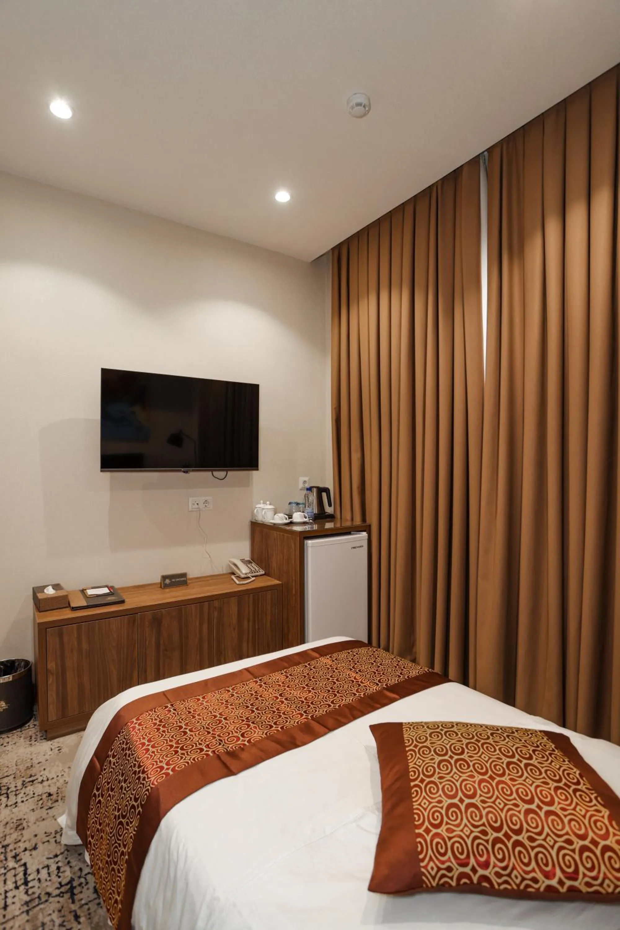 Bed in Bogishamol Hotel