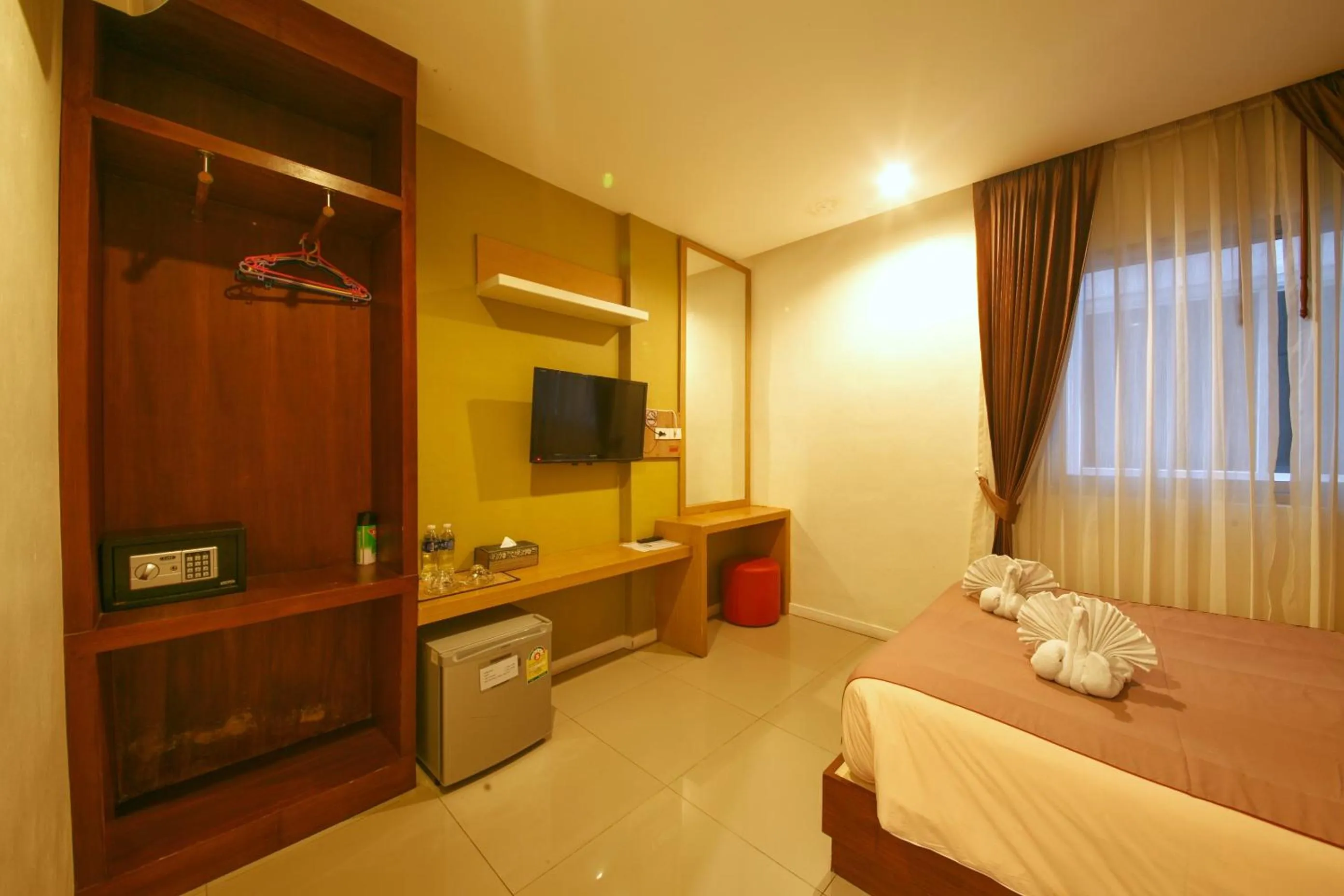 TV/Entertainment Center in Tropical Sunset Hotel Patong