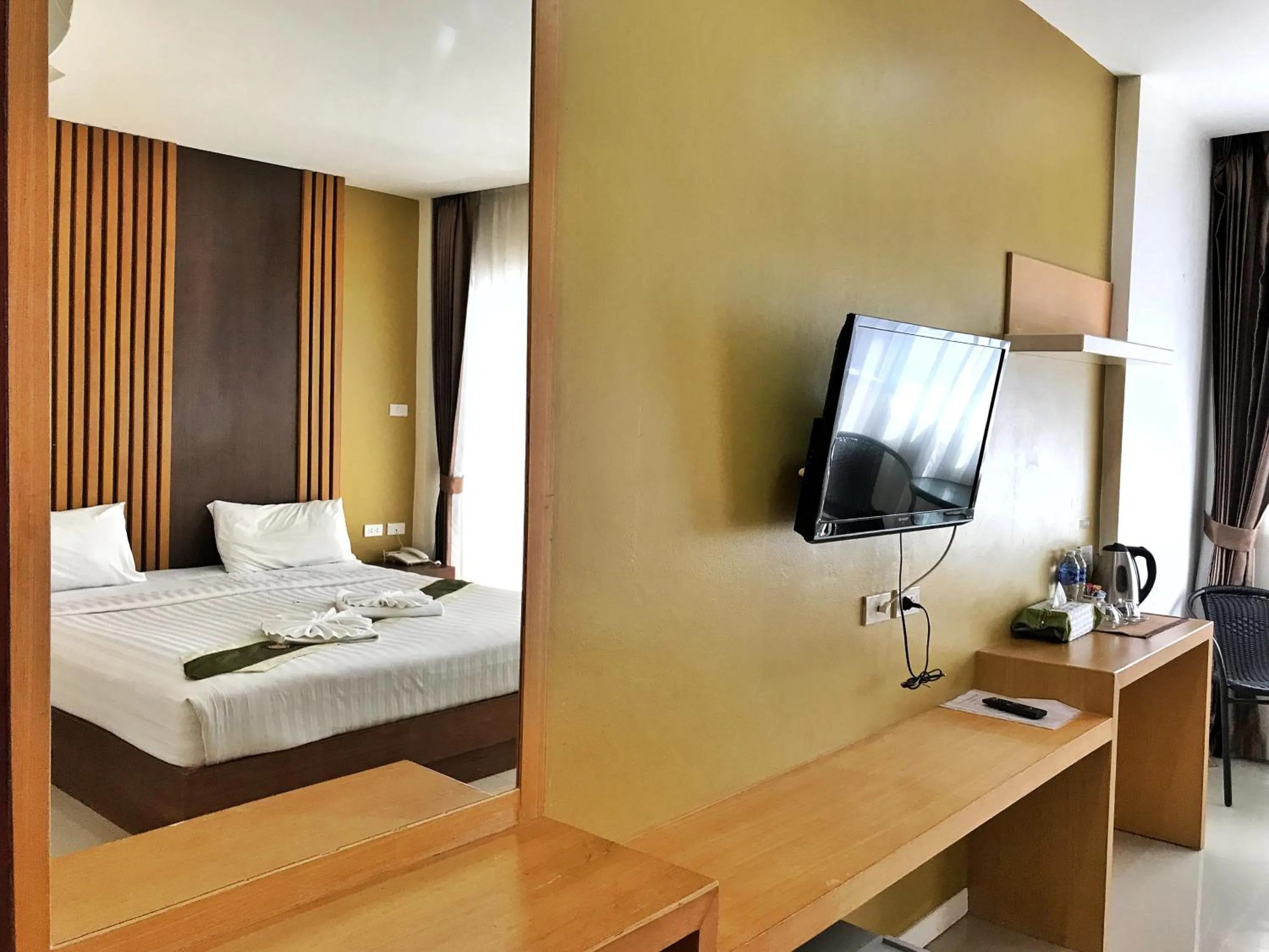 TV/Entertainment Center in Tropical Sunset Hotel Patong