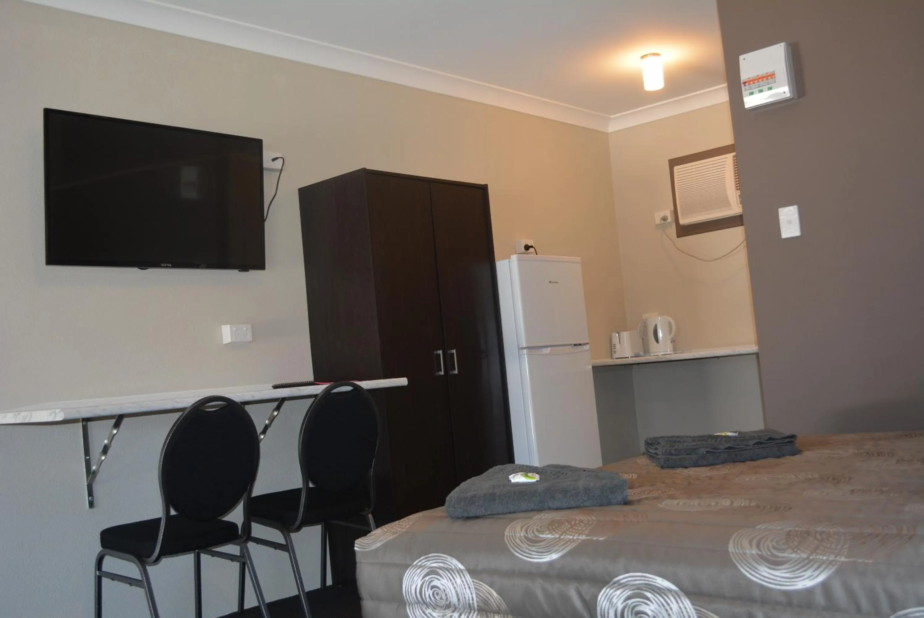 Bed in Carmila Sands Motel