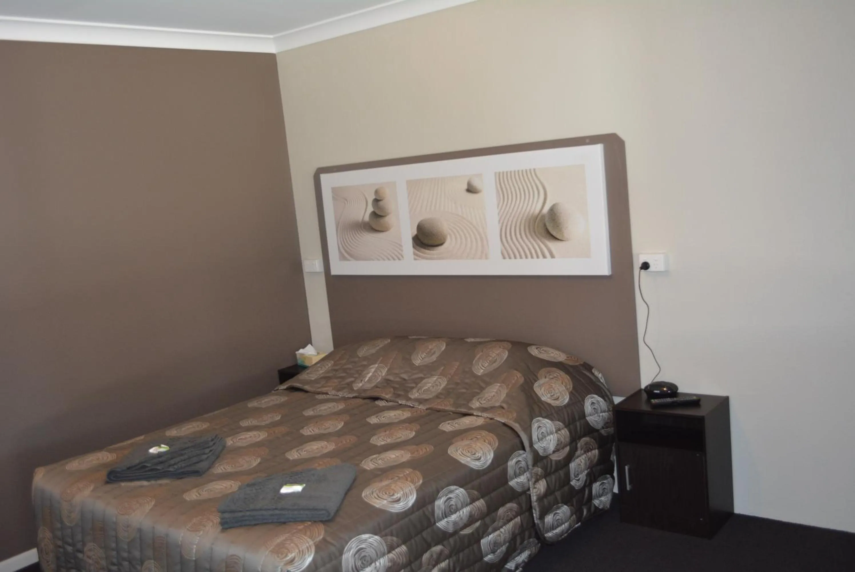 Bed in Carmila Sands Motel