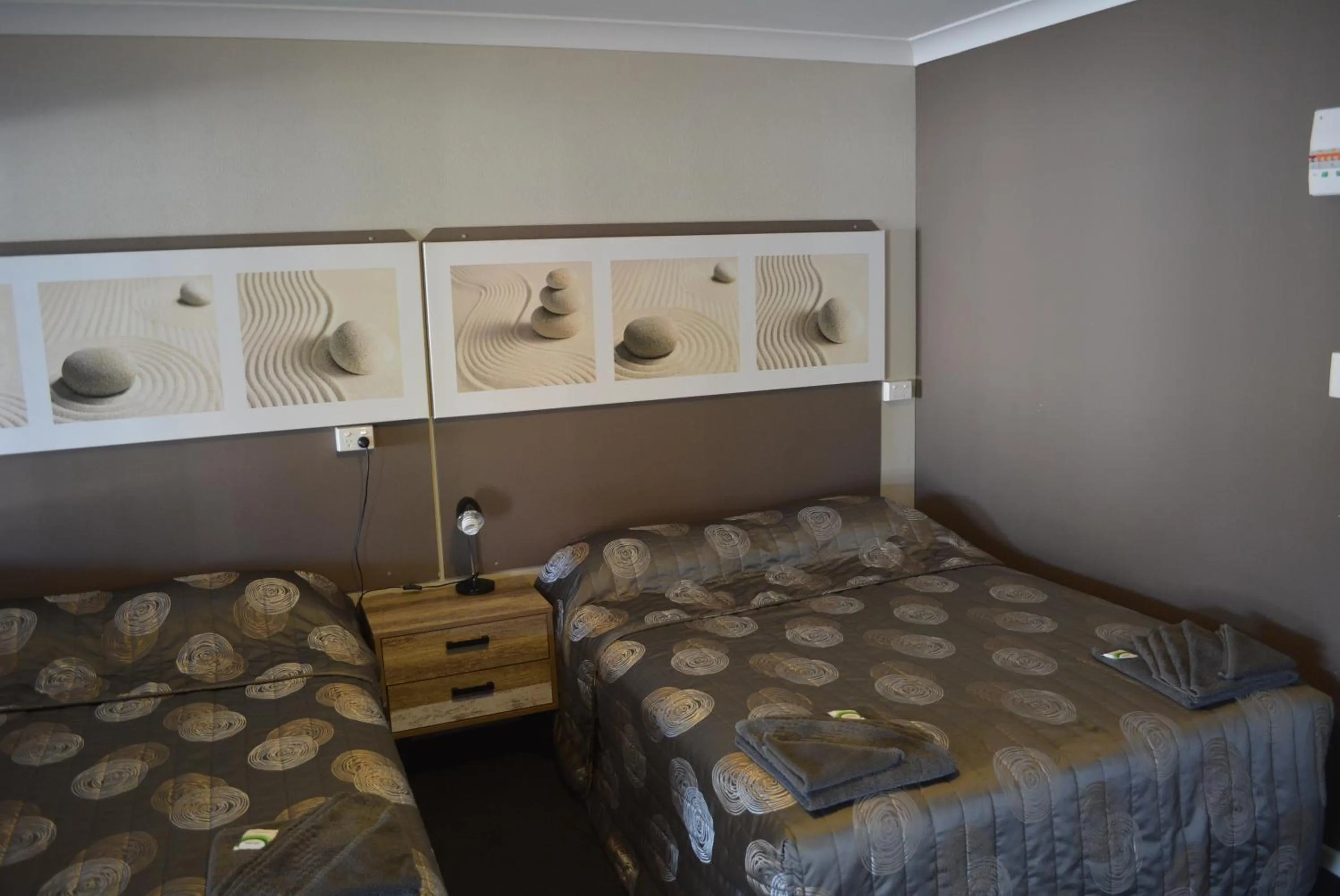 Bed in Carmila Sands Motel