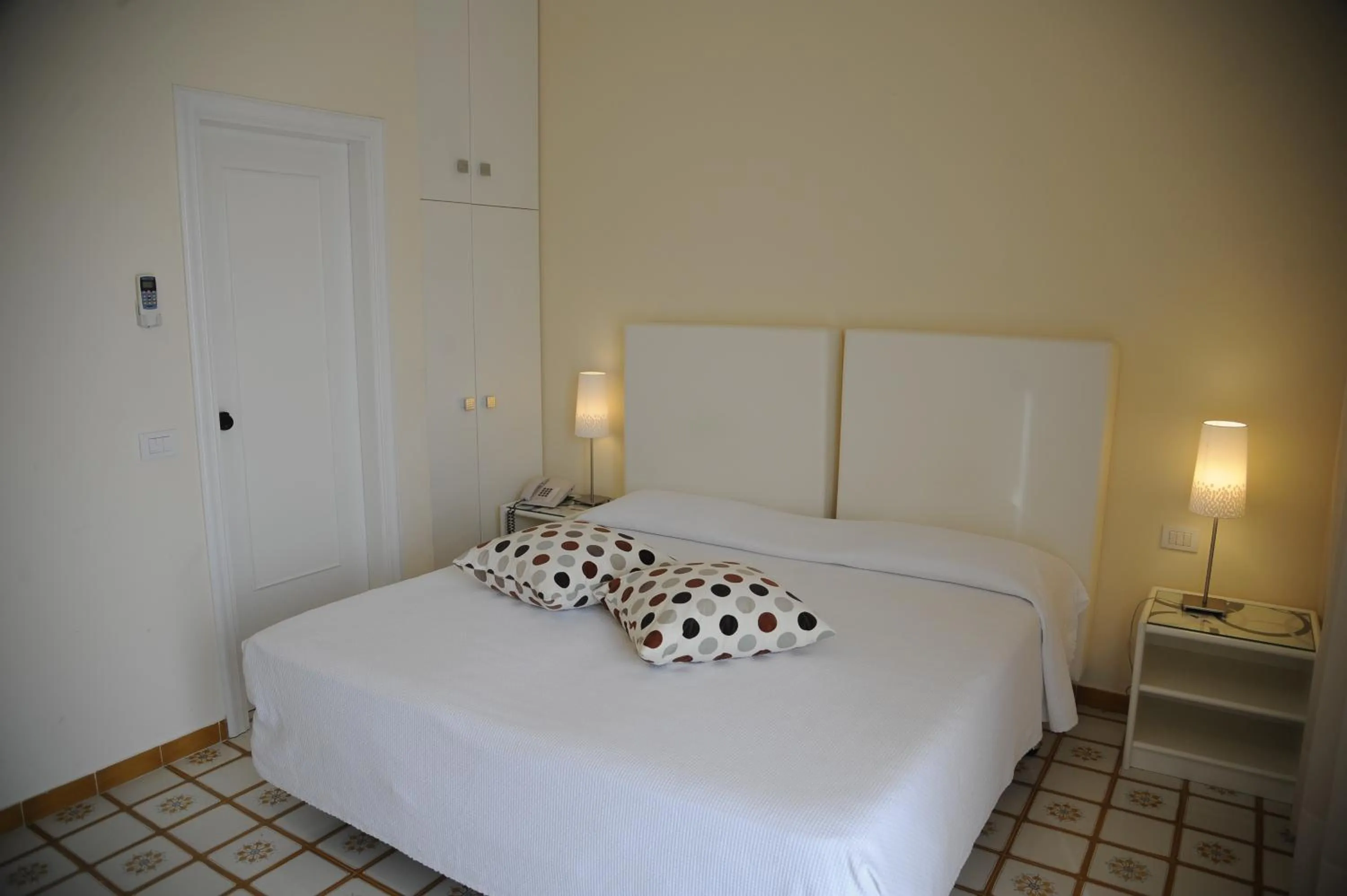 Bed in Via Capo Rooms