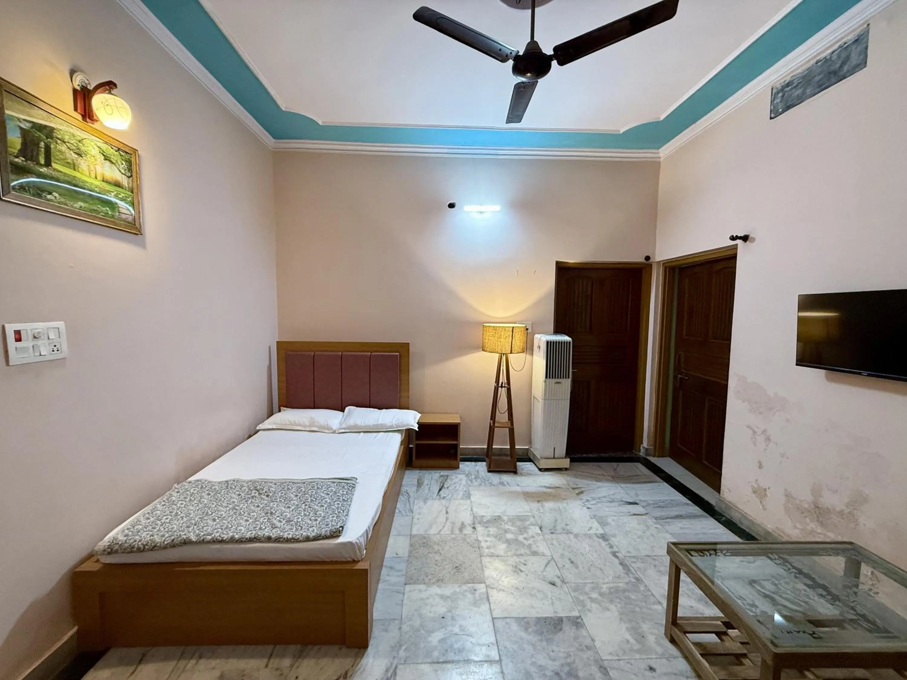 Bed in Madhuraj Villa Homestay