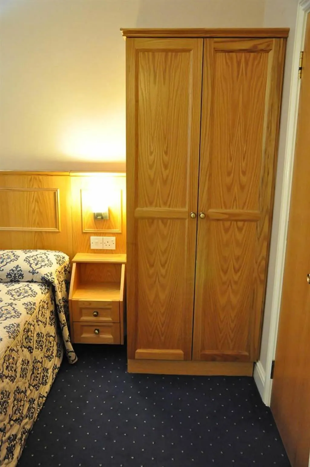 Decorative detail, Bed in Olympic House Hotel