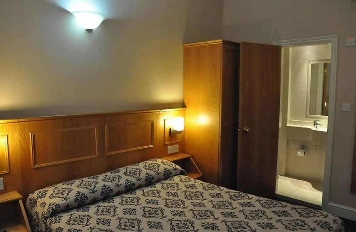 Bed in Olympic House Hotel