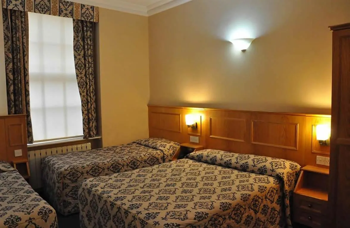 Bed in Olympic House Hotel