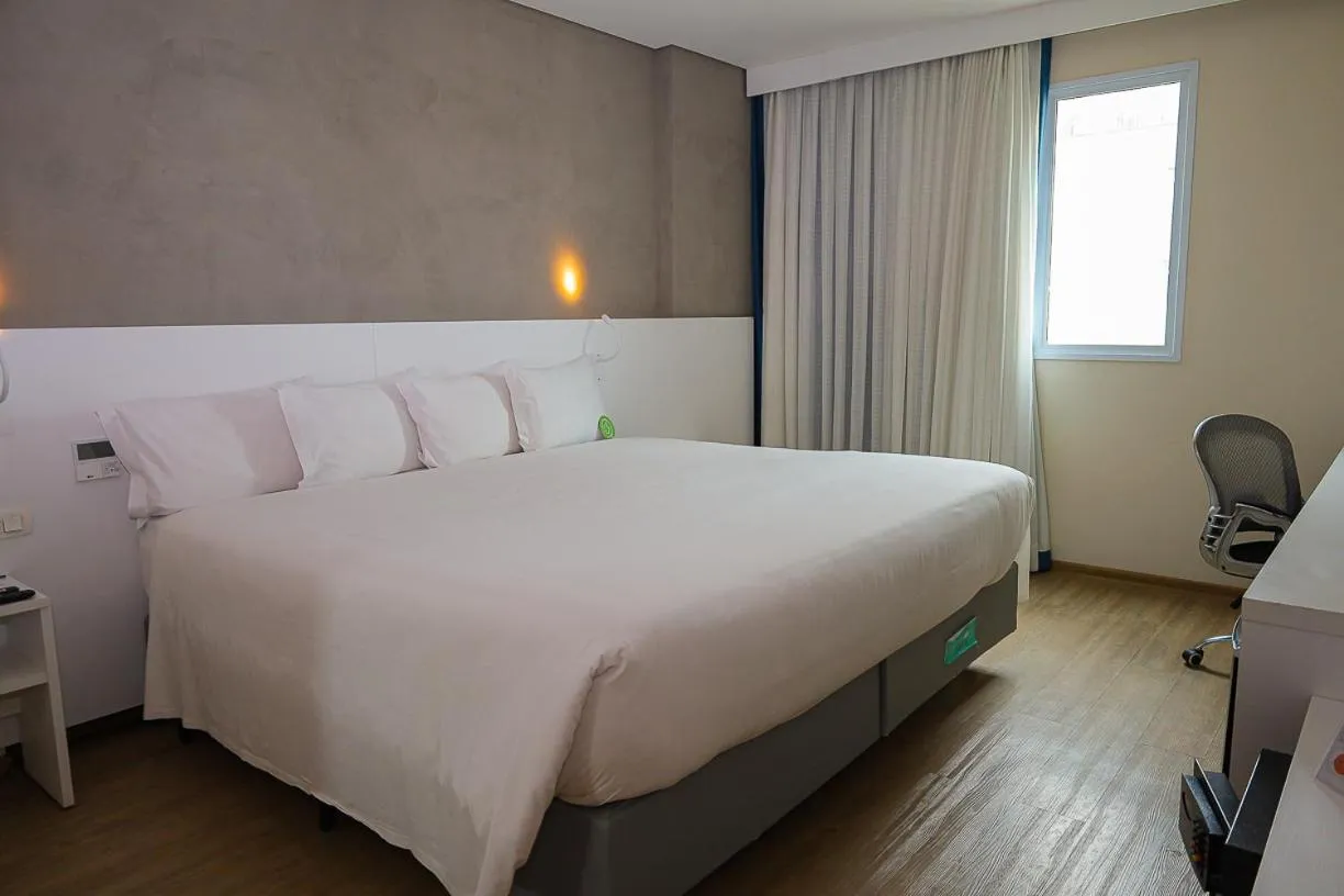 Bed in eSuites Virgínia Luxemburgo