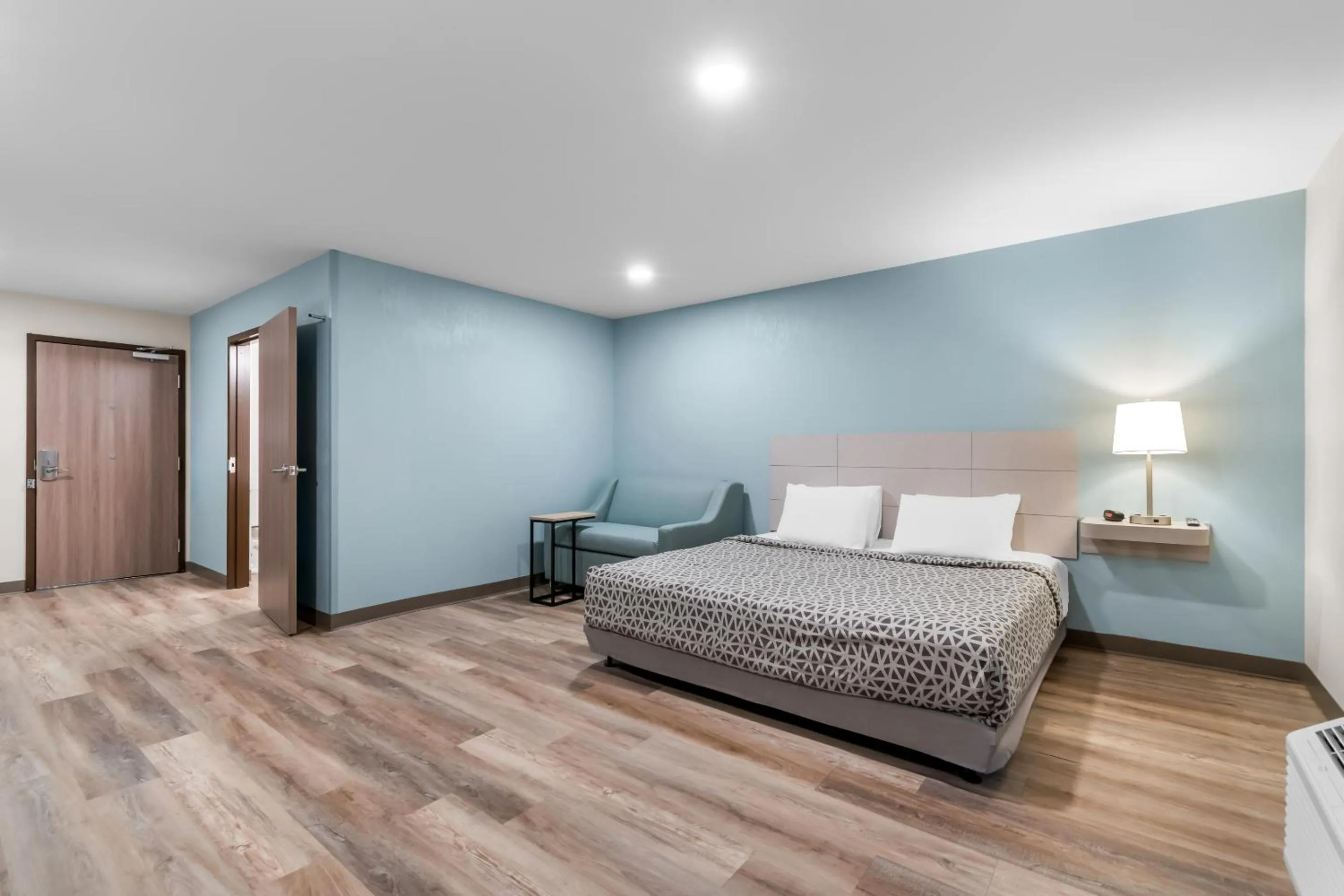 Bedroom, Bed in WoodSpring Suites Harrisburg Carlisle