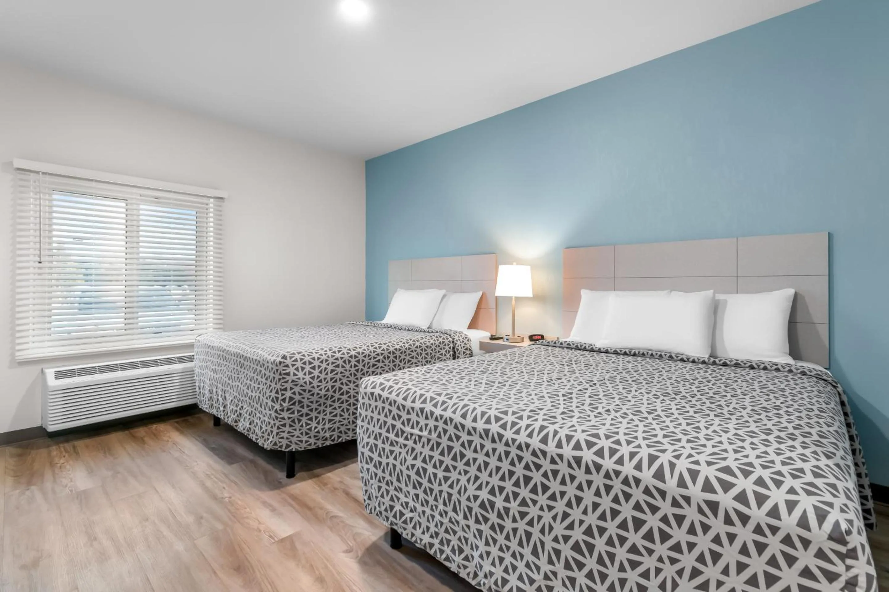 Bed in WoodSpring Suites Harrisburg Carlisle