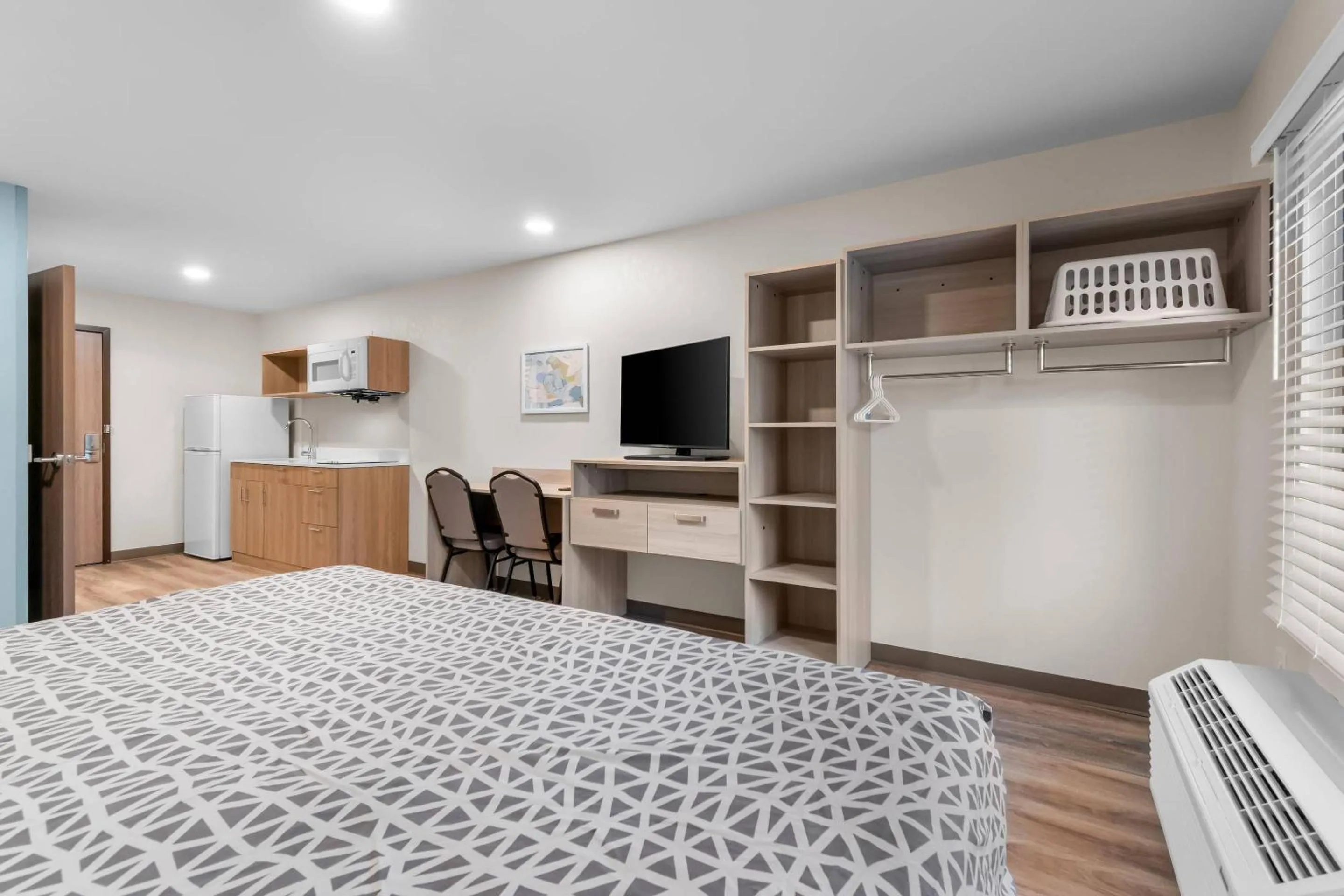 Bedroom, Bed in WoodSpring Suites Harrisburg Carlisle