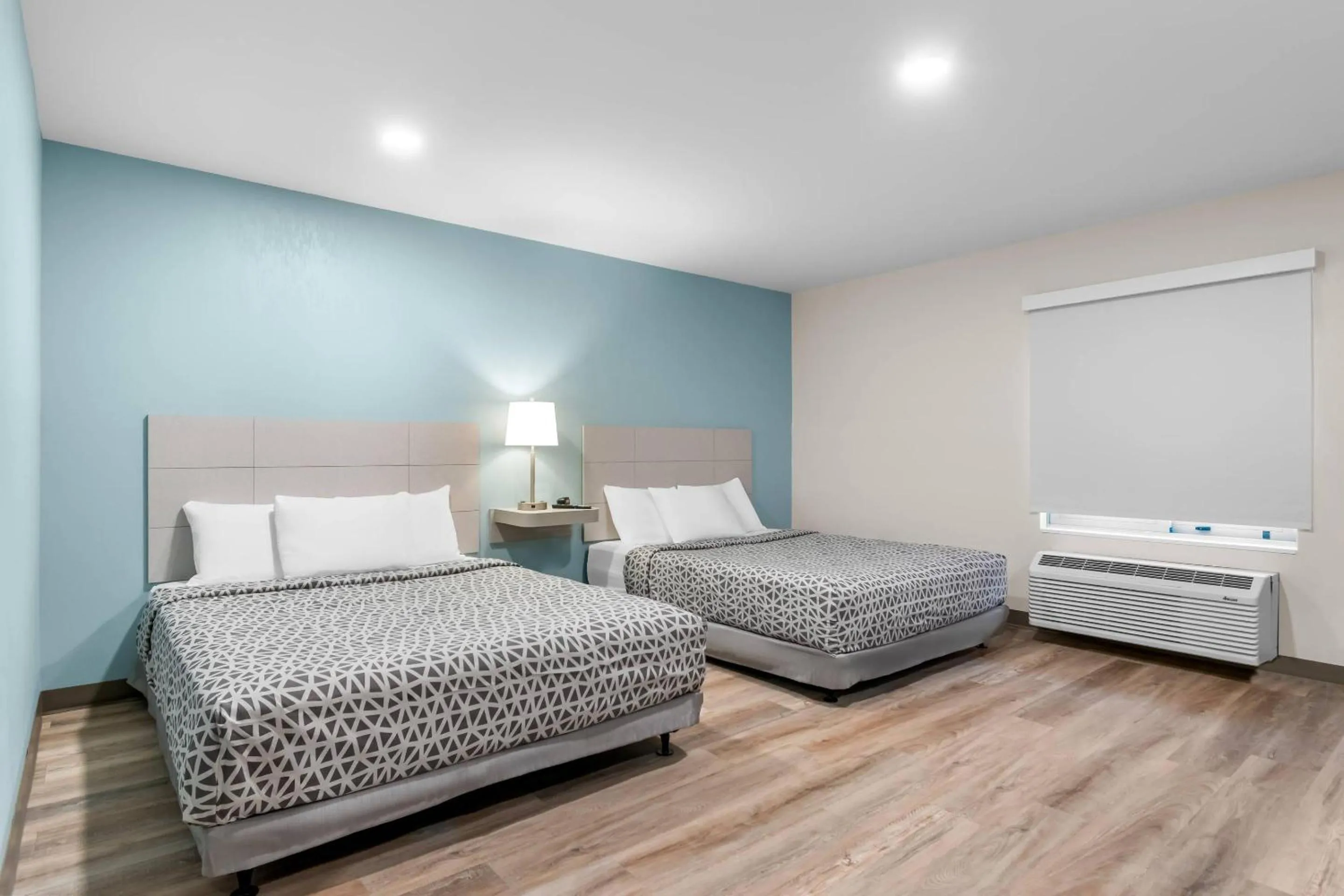 Bedroom, Bed in WoodSpring Suites Harrisburg Carlisle