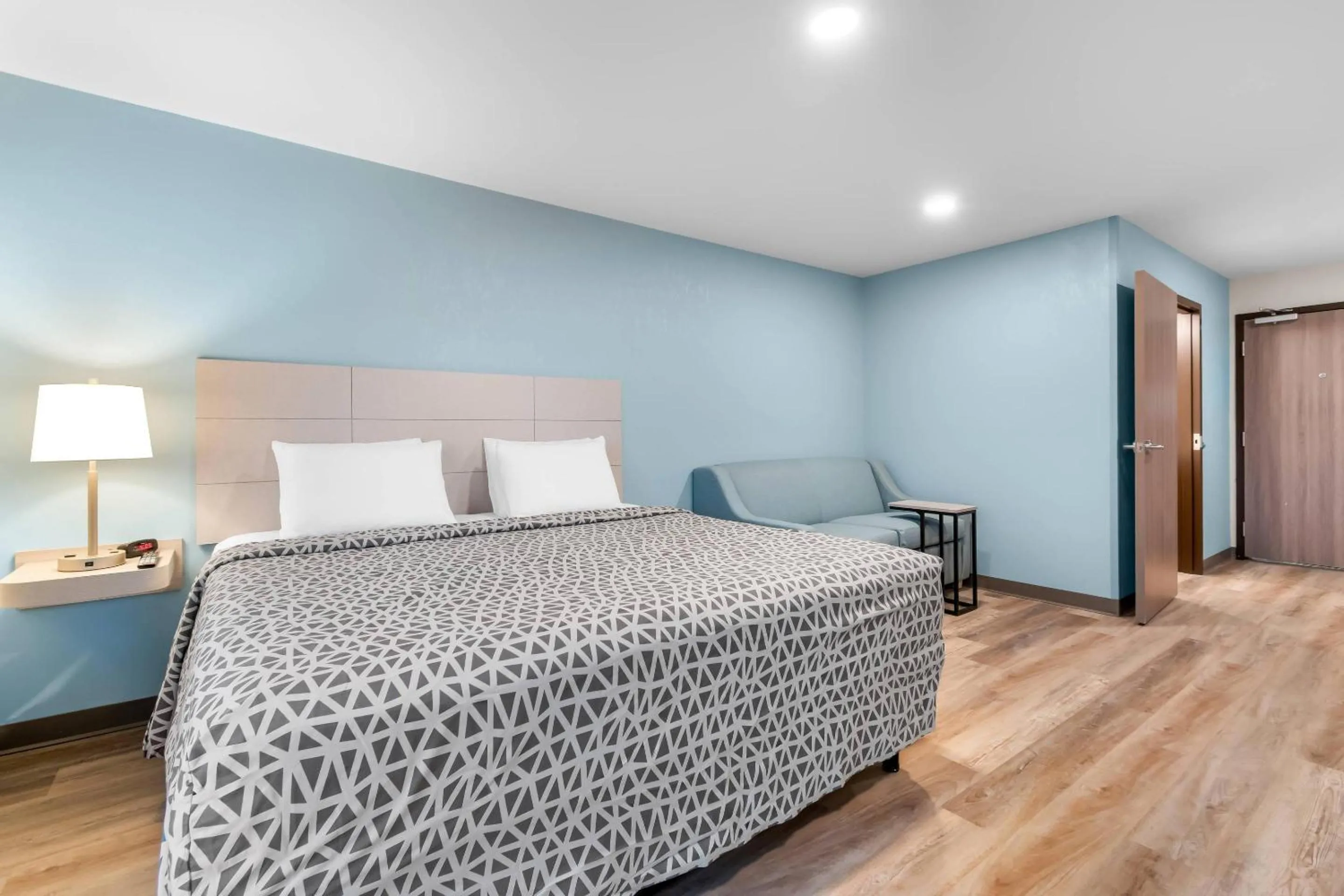 Bedroom, Bed in WoodSpring Suites Harrisburg Carlisle